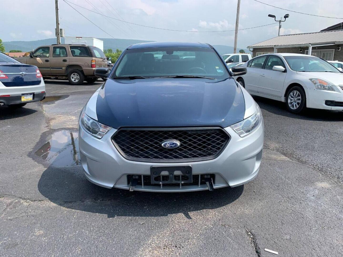 2016 Silver Ford Taurus (1FAHP2MKXGG) with an 3.7L V6 3.7L V6 engine, located at 4845 Woodbury Pike, Roaring Springs, PA, (814) 317-5008, (814) 317-5008, 40.250935, -78.366959 - 2016 Ford Taurus Police Interceptor, AWD, 140k, 3.7L, V6, automatic, Flex Fuel, power windows/locks, air conditioning, rear back up, like new tires, new inspection. Retired government vehicle! Clean! Well maintained! If interested, please call 814-317-5008 or 814-497-4383. - Photo#3