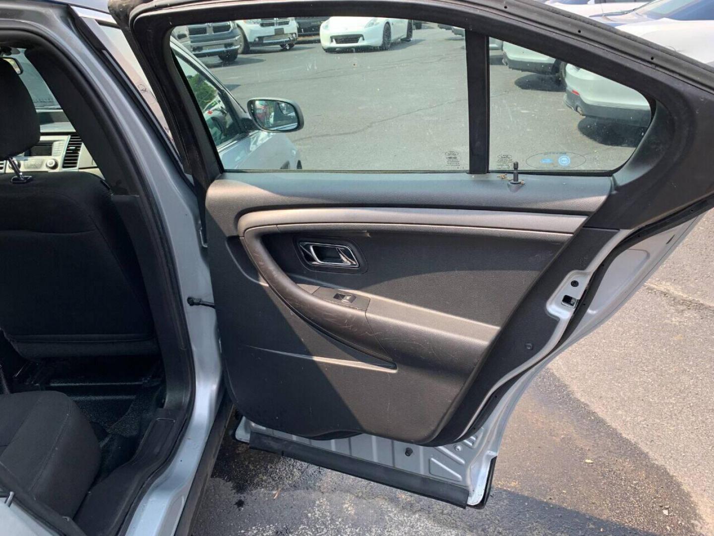 2016 Silver Ford Taurus (1FAHP2MKXGG) with an 3.7L V6 3.7L V6 engine, located at 4845 Woodbury Pike, Roaring Springs, PA, (814) 317-5008, (814) 317-5008, 40.250935, -78.366959 - 2016 Ford Taurus Police Interceptor, AWD, 140k, 3.7L, V6, automatic, Flex Fuel, power windows/locks, air conditioning, rear back up, like new tires, new inspection. Retired government vehicle! Clean! Well maintained! If interested, please call 814-317-5008 or 814-497-4383. - Photo#11