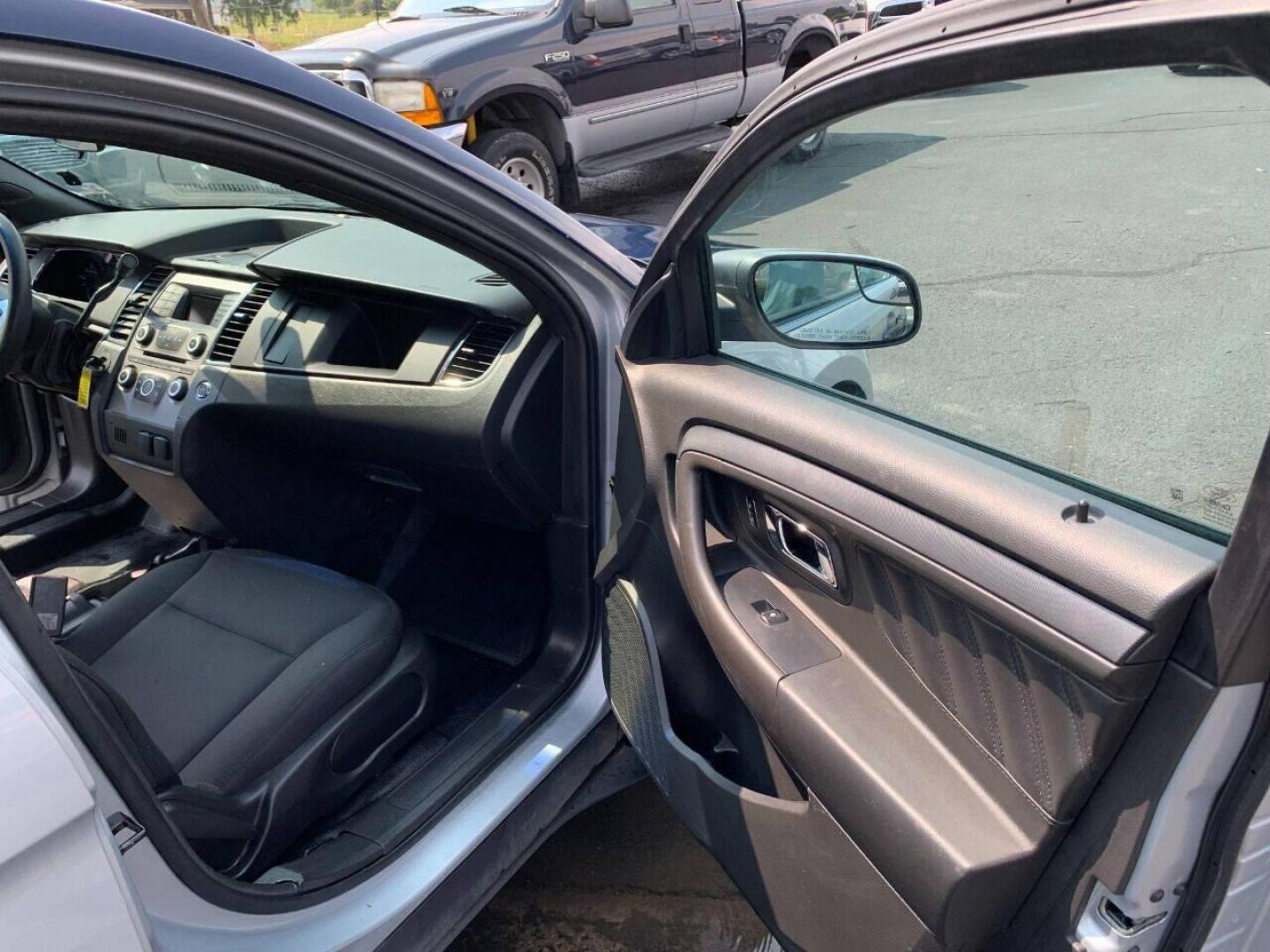 2016 Silver Ford Taurus (1FAHP2MKXGG) with an 3.7L V6 3.7L V6 engine, located at 4845 Woodbury Pike, Roaring Springs, PA, (814) 317-5008, (814) 317-5008, 40.250935, -78.366959 - 2016 Ford Taurus Police Interceptor, AWD, 140k, 3.7L, V6, automatic, Flex Fuel, power windows/locks, air conditioning, rear back up, like new tires, new inspection. Retired government vehicle! Clean! Well maintained! If interested, please call 814-317-5008 or 814-497-4383. - Photo#12