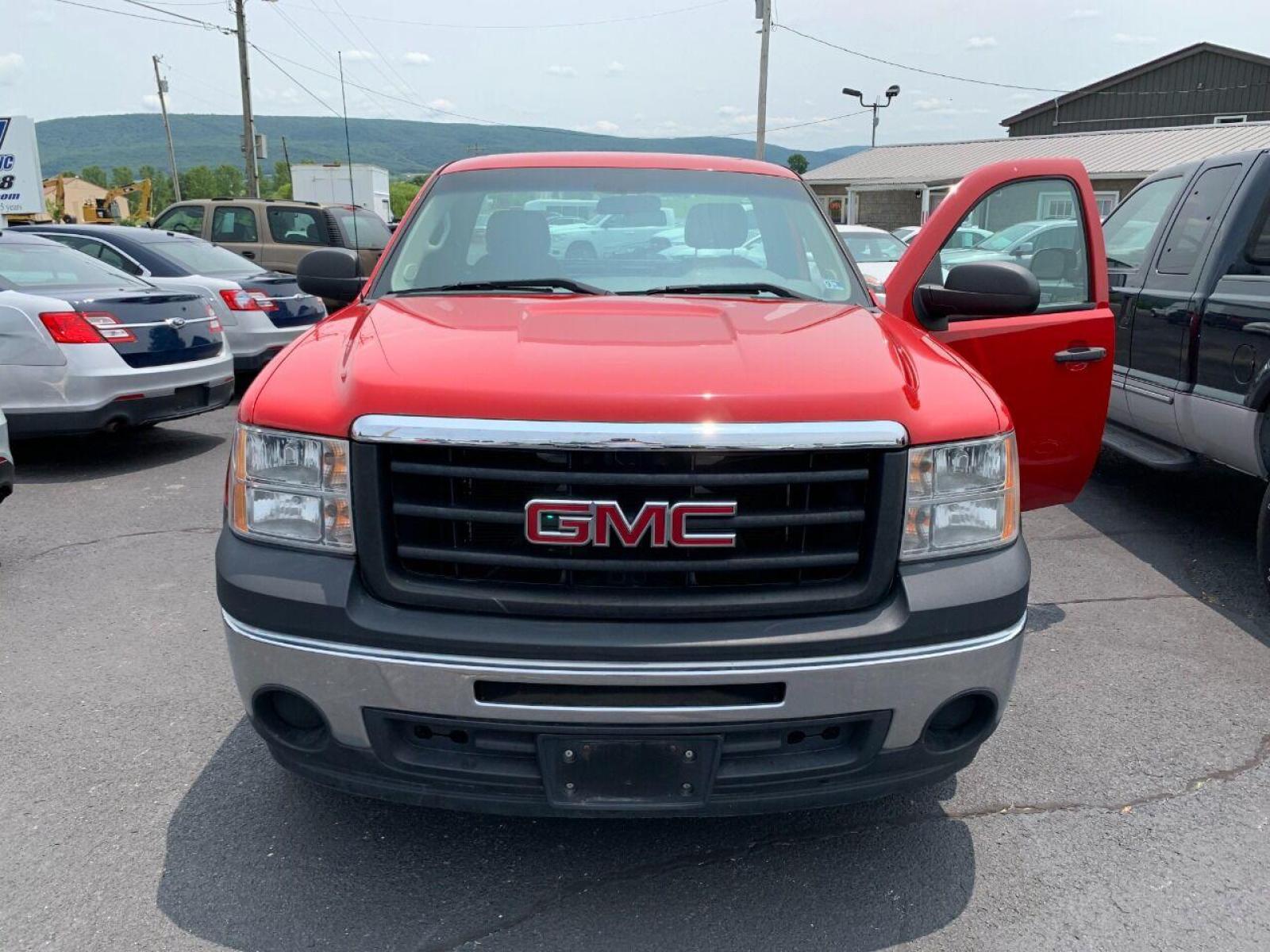 2013 Red GMC Sierra 1500 (1GTN1TEX1DZ) with an 4.3L V6 4.3L V6 engine, located at 4845 Woodbury Pike, Roaring Springs, PA, (814) 317-5008, (814) 317-5008, 40.250935, -78.366959 - 2013 GMC Sierra, Single Cab, 8ft bed, 4x2, 4.3L, V6, like new tires, new inspection, power windows/locks, cruise/tilt wheel, air conditioning,231k, Southern Truck, Absolutely Rust free! Must see condition! Clean! 1 Owner! Truck gets excellent fuel mileage! Truck has high highway miles. Company - Photo #2
