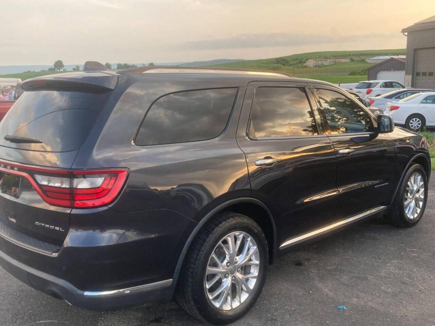 2014 Black Dodge Durango (1C4RDHEG2EC) with an 3.6L V6 3.6L V6 engine, located at 4845 Woodbury Pike, Roaring Springs, PA, (814) 317-5008, (814) 317-5008, 40.250935, -78.366959 - Photo#3