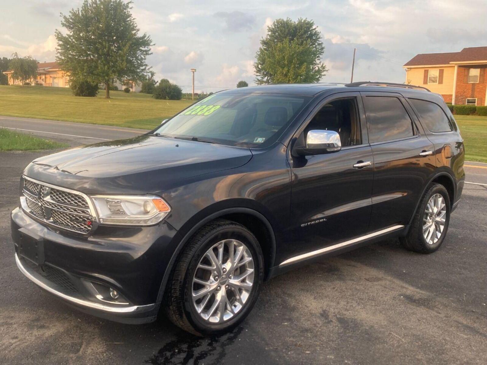 2014 Black Dodge Durango (1C4RDHEG2EC) with an 3.6L V6 3.6L V6 engine, located at 4845 Woodbury Pike, Roaring Springs, PA, (814) 317-5008, (814) 317-5008, 40.250935, -78.366959 - 2014 Dodge Durango, Citadel, Fully loaded, V6, automatic, 155k, 4x2, Navigation, DVD, sunroof, heated/air front and rear seats, 20 wheels, blind side detection, lane departure, automatic wipers and so much more. This vehicle is a must see! Clean, Mint condition! Will come with a 3 month/3000 mile - Photo #0