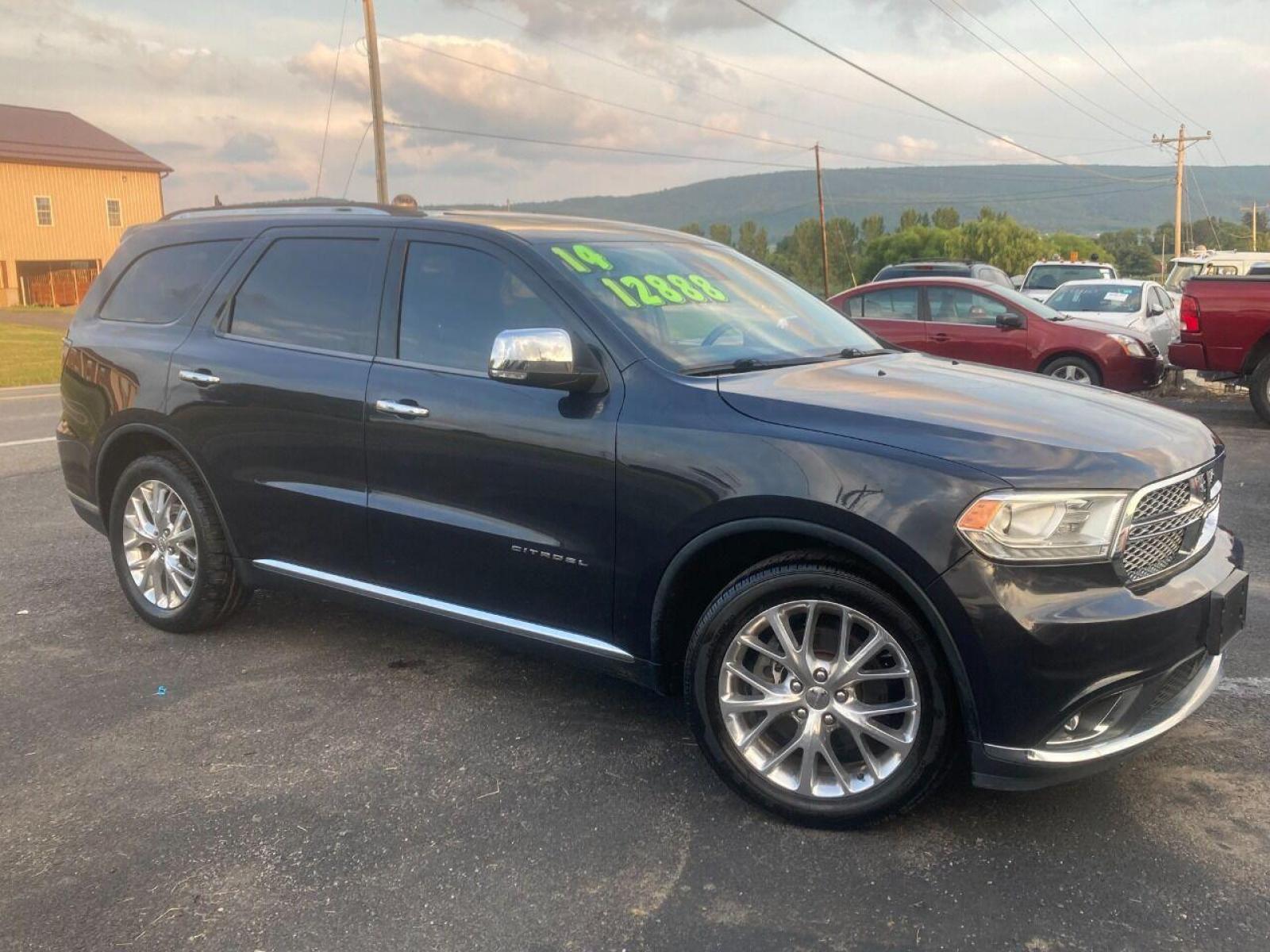 2014 Black Dodge Durango (1C4RDHEG2EC) with an 3.6L V6 3.6L V6 engine, located at 4845 Woodbury Pike, Roaring Springs, PA, (814) 317-5008, (814) 317-5008, 40.250935, -78.366959 - 2014 Dodge Durango, Citadel, Fully loaded, V6, automatic, 155k, 4x2, Navigation, DVD, sunroof, heated/air front and rear seats, 20 wheels, blind side detection, lane departure, automatic wipers and so much more. This vehicle is a must see! Clean, Mint condition! Will come with a 3 month/3000 mile - Photo #1