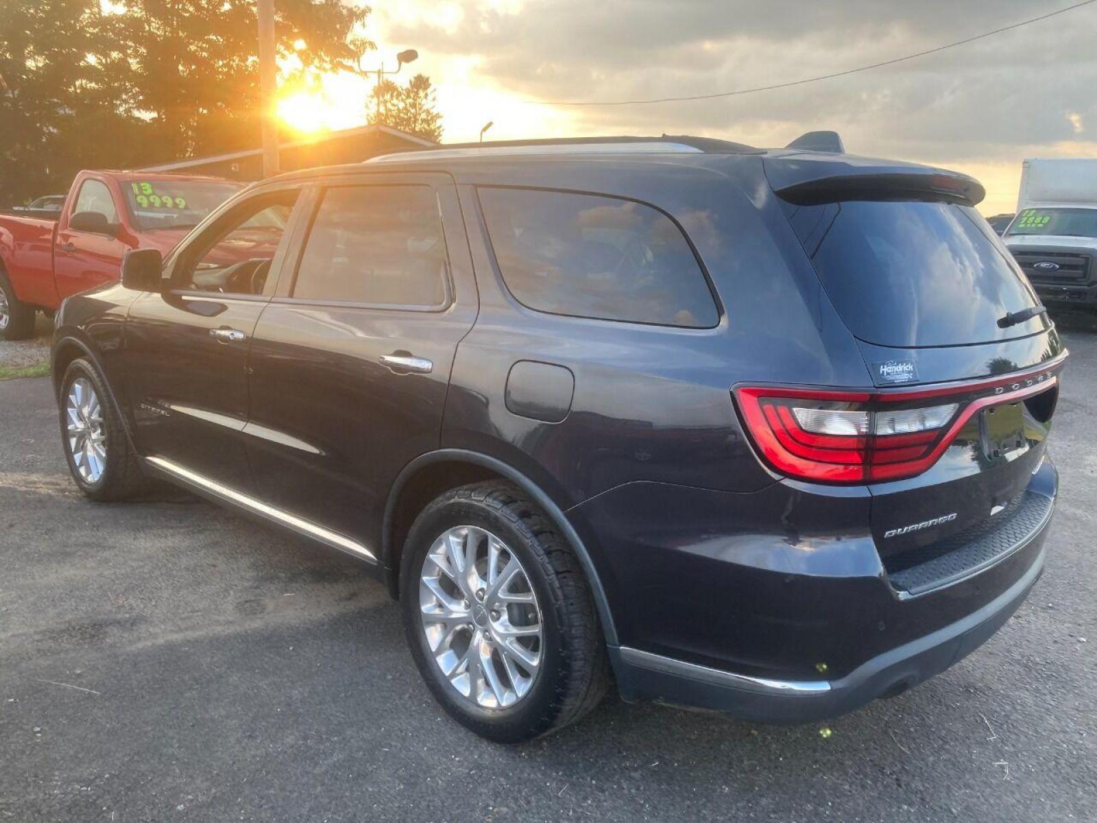 2014 Black Dodge Durango (1C4RDHEG2EC) with an 3.6L V6 3.6L V6 engine, located at 4845 Woodbury Pike, Roaring Springs, PA, (814) 317-5008, (814) 317-5008, 40.250935, -78.366959 - 2014 Dodge Durango, Citadel, Fully loaded, V6, automatic, 155k, 4x2, Navigation, DVD, sunroof, heated/air front and rear seats, 20 wheels, blind side detection, lane departure, automatic wipers and so much more. This vehicle is a must see! Clean, Mint condition! Will come with a 3 month/3000 mile - Photo #4