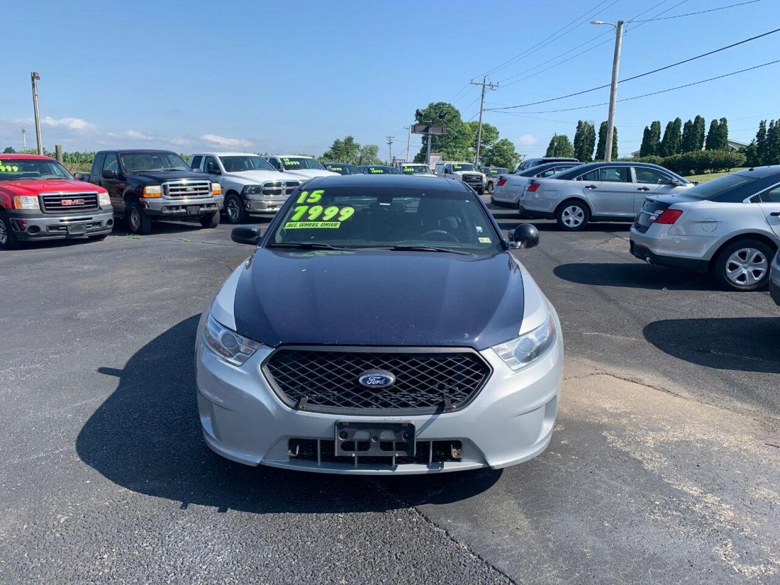 2015 Other Ford Taurus (1FAHP2MK5FG) with an 3.7L V6 3.7L V6 engine, located at 4845 Woodbury Pike, Roaring Springs, PA, (814) 317-5008, (814) 317-5008, 40.250935, -78.366959 - 2015 Ford Taurus Police Sedan, AWD, 135k, 3.7L, V6, power windows/locks, cruise/tilt wheel, air conditioning, steering controls, Flex fuel, rear back up, well maintained, new inspection and more. Southern retired government vehicle. To see a full list of this vehicles options visit smithfamilycarsto - Photo #3