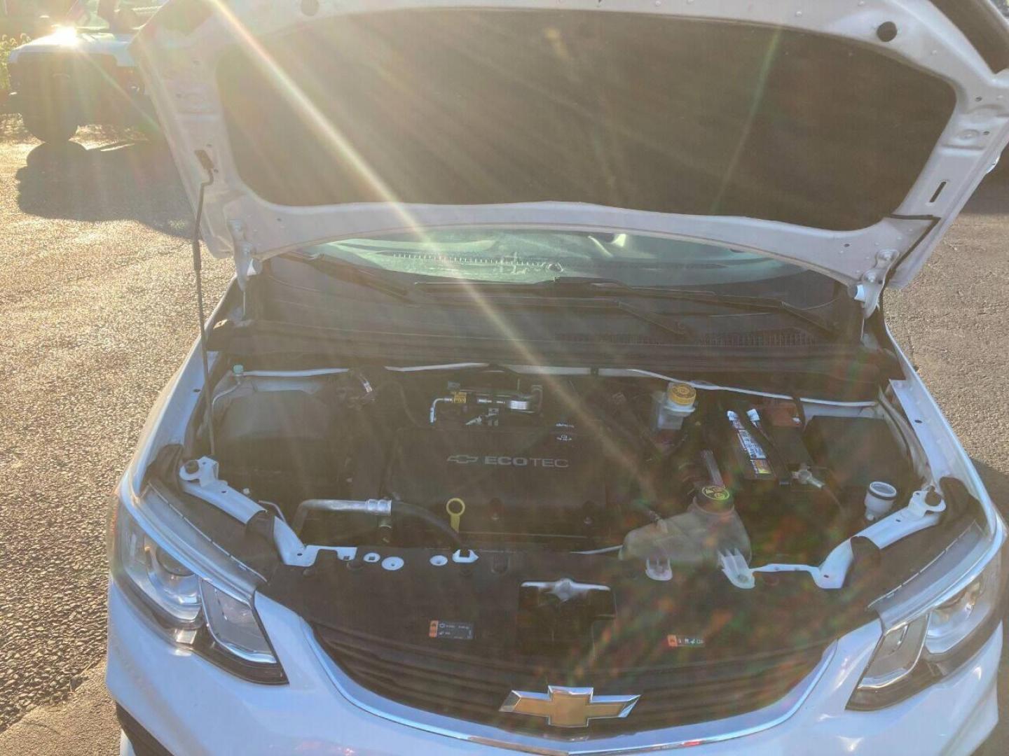 2017 White Chevrolet Sonic (1G1JG6SH7H4) with an 1.8L I4 1.8L I4 engine, located at 4845 Woodbury Pike, Roaring Springs, PA, (814) 317-5008, (814) 317-5008, 40.250935, -78.366959 - 2017 Chevy Sonic, FWD, automatic, 4 cylinder, 141k, hatchback, new inspection, 1 Owner, rear back up camera, air conditioning, bluetooth, cruise/tilt and much more. This vehicle was a Southern lease vehicle. No rust! New inspection ready to go. Will come with a 3 month/3000 mile power train warr - Photo#4
