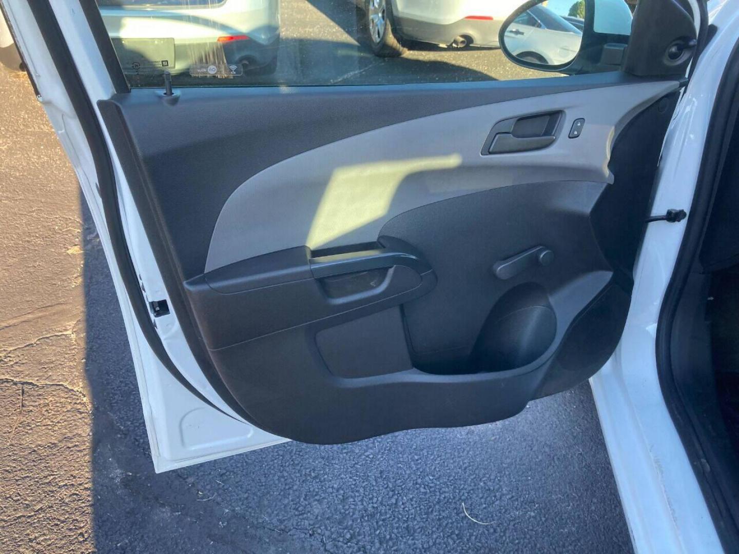 2017 White Chevrolet Sonic (1G1JG6SH7H4) with an 1.8L I4 1.8L I4 engine, located at 4845 Woodbury Pike, Roaring Springs, PA, (814) 317-5008, (814) 317-5008, 40.250935, -78.366959 - 2017 Chevy Sonic, FWD, automatic, 4 cylinder, 141k, hatchback, new inspection, 1 Owner, rear back up camera, air conditioning, bluetooth, cruise/tilt and much more. This vehicle was a Southern lease vehicle. No rust! New inspection ready to go. Will come with a 3 month/3000 mile power train warr - Photo#5