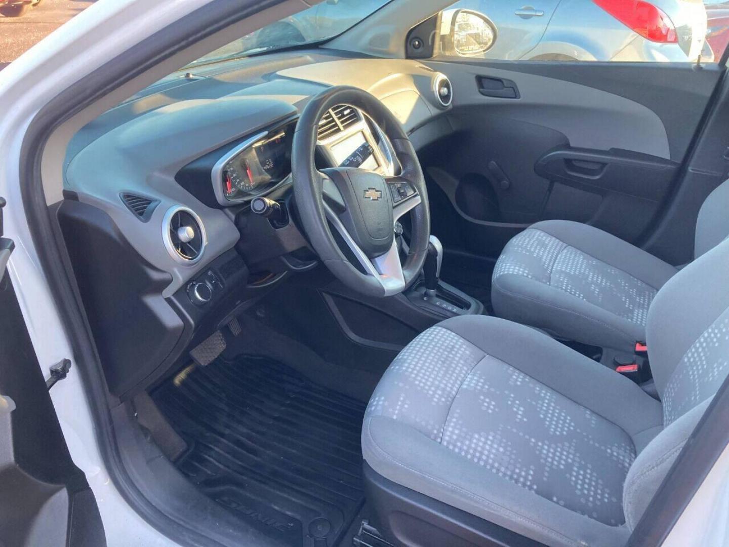 2017 White Chevrolet Sonic (1G1JG6SH7H4) with an 1.8L I4 1.8L I4 engine, located at 4845 Woodbury Pike, Roaring Springs, PA, (814) 317-5008, (814) 317-5008, 40.250935, -78.366959 - 2017 Chevy Sonic, FWD, automatic, 4 cylinder, 141k, hatchback, new inspection, 1 Owner, rear back up camera, air conditioning, bluetooth, cruise/tilt and much more. This vehicle was a Southern lease vehicle. No rust! New inspection ready to go. Will come with a 3 month/3000 mile power train warr - Photo#6