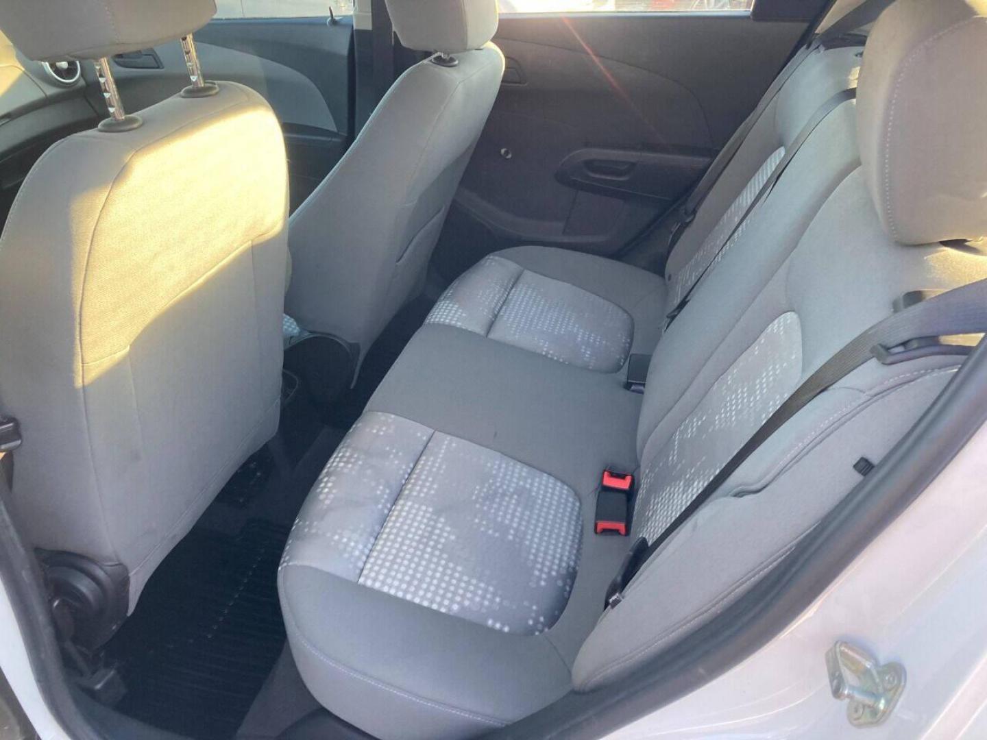 2017 White Chevrolet Sonic (1G1JG6SH7H4) with an 1.8L I4 1.8L I4 engine, located at 4845 Woodbury Pike, Roaring Springs, PA, (814) 317-5008, (814) 317-5008, 40.250935, -78.366959 - 2017 Chevy Sonic, FWD, automatic, 4 cylinder, 141k, hatchback, new inspection, 1 Owner, rear back up camera, air conditioning, bluetooth, cruise/tilt and much more. This vehicle was a Southern lease vehicle. No rust! New inspection ready to go. Will come with a 3 month/3000 mile power train warr - Photo#8