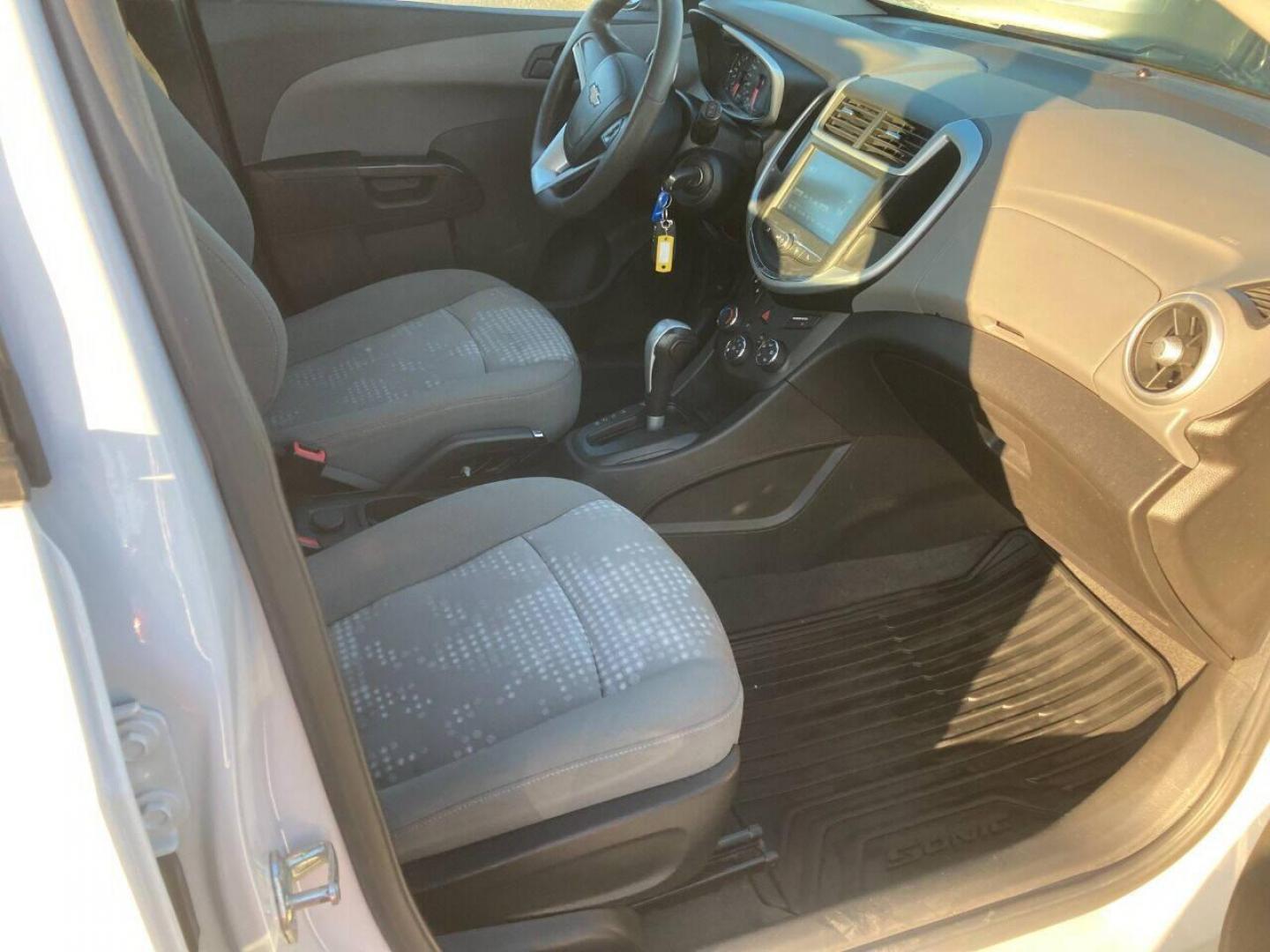2017 White Chevrolet Sonic (1G1JG6SH7H4) with an 1.8L I4 1.8L I4 engine, located at 4845 Woodbury Pike, Roaring Springs, PA, (814) 317-5008, (814) 317-5008, 40.250935, -78.366959 - 2017 Chevy Sonic, FWD, automatic, 4 cylinder, 141k, hatchback, new inspection, 1 Owner, rear back up camera, air conditioning, bluetooth, cruise/tilt and much more. This vehicle was a Southern lease vehicle. No rust! New inspection ready to go. Will come with a 3 month/3000 mile power train warr - Photo#10