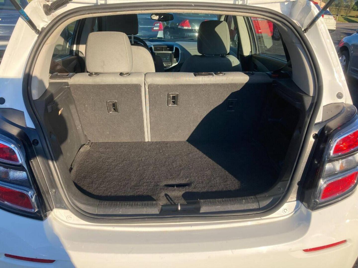 2017 White Chevrolet Sonic (1G1JG6SH7H4) with an 1.8L I4 1.8L I4 engine, located at 4845 Woodbury Pike, Roaring Springs, PA, (814) 317-5008, (814) 317-5008, 40.250935, -78.366959 - 2017 Chevy Sonic, FWD, automatic, 4 cylinder, 141k, hatchback, new inspection, 1 Owner, rear back up camera, air conditioning, bluetooth, cruise/tilt and much more. This vehicle was a Southern lease vehicle. No rust! New inspection ready to go. Will come with a 3 month/3000 mile power train warr - Photo#12