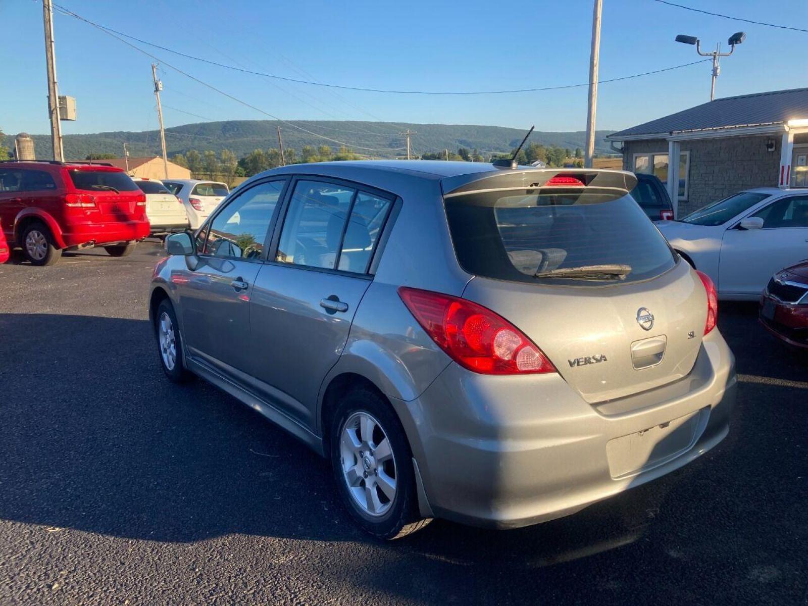 2011 Pewter Nissan Versa (3N1BC1CP5BL) with an 1.8L I4 1.8L I4 engine, located at 4845 Woodbury Pike, Roaring Springs, PA, (814) 317-5008, (814) 317-5008, 40.250935, -78.366959 - 2011 Nissan Versa SL, automatic, 116k, power windows/locks, cruise/tilt wheel, navigation, new tires, new inspection and more. Vehicle is Southern! Will come with a 3 month/3000 mile power train warranty with the option to upgrade. If interested, please call 814-317-5008 or 814-497-4383. - Photo #3