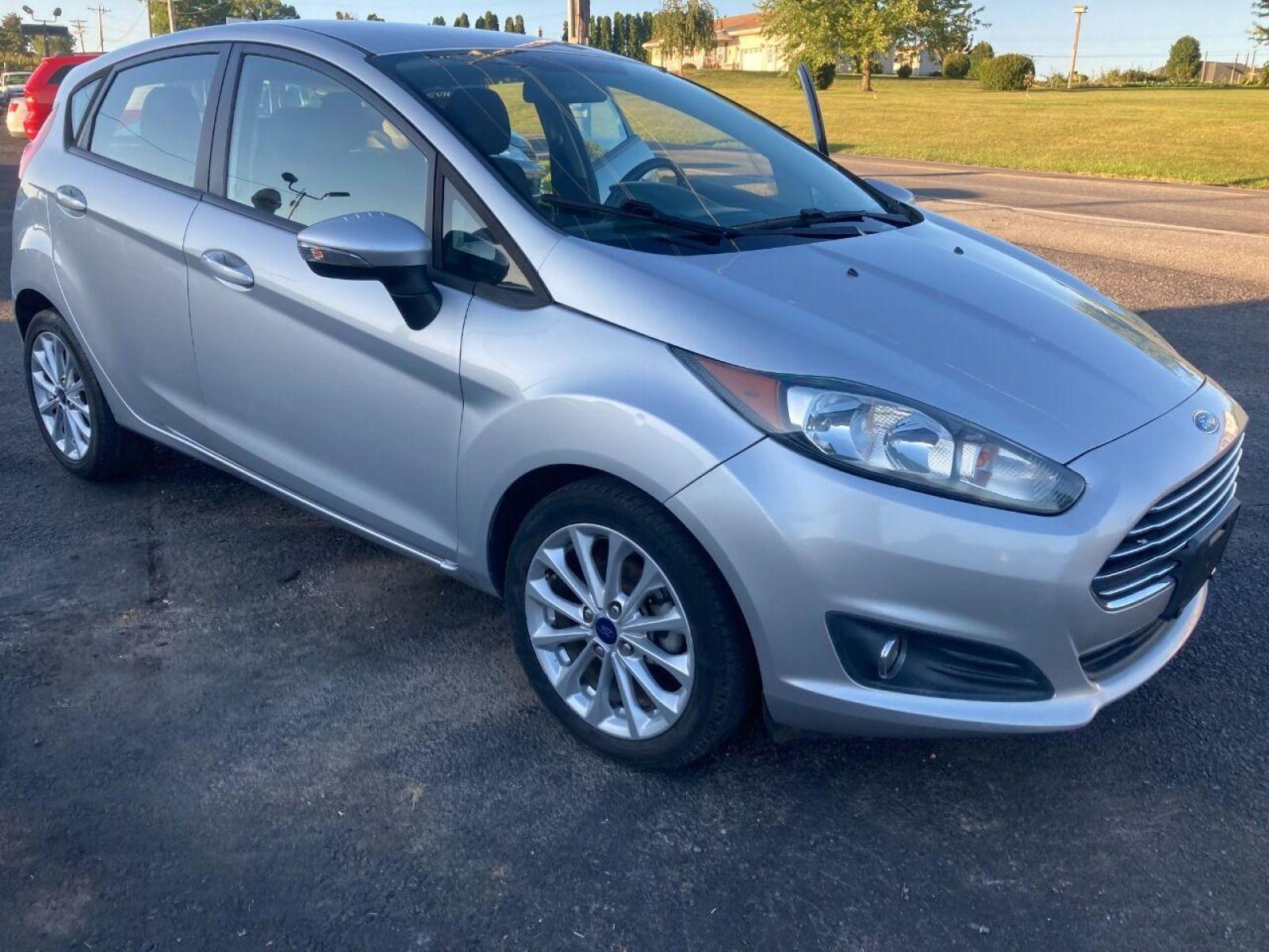 2014 Silver Ford Fiesta (3FADP4EJXEM) with an 1.6L I4 1.6L I4 engine, located at 4845 Woodbury Pike, Roaring Springs, PA, (814) 317-5008, (814) 317-5008, 40.250935, -78.366959 - 2014 Ford Fiesta SE, automatic, FWD, 79k, 4 cylinder, loaded, navigation, aluminum wheels, hatchback, fog lights, Siri, factory upgraded lighting interior and much more! Southern vehicle! New inspection! Runs 100%. If interested, please call 814-317-5008 or 814-497-4383. - Photo #0