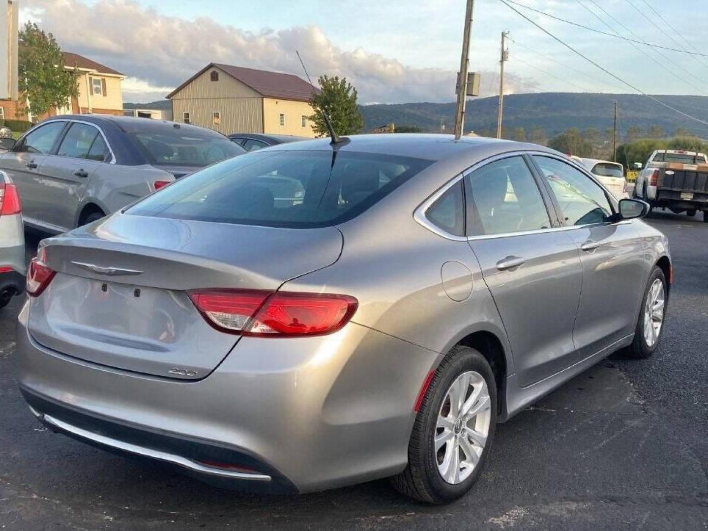 2015 Silver Chrysler 200 (1C3CCCAB6FN) with an 2.4L I4 2.4L I4 engine, located at 4845 Woodbury Pike, Roaring Springs, PA, (814) 317-5008, (814) 317-5008, 40.250935, -78.366959 - One owner! 2015 Chrysler 200, FWD, automatic, 151k, 4 cylinder, power windows/locks, cruise/tilt wheel, air conditioning, steering controls, driving lights and more. Excellent condition! Southern car! Rust Free! New inspection! If interested, please call 814-317-5008 or 814-497-4383. - Photo#2