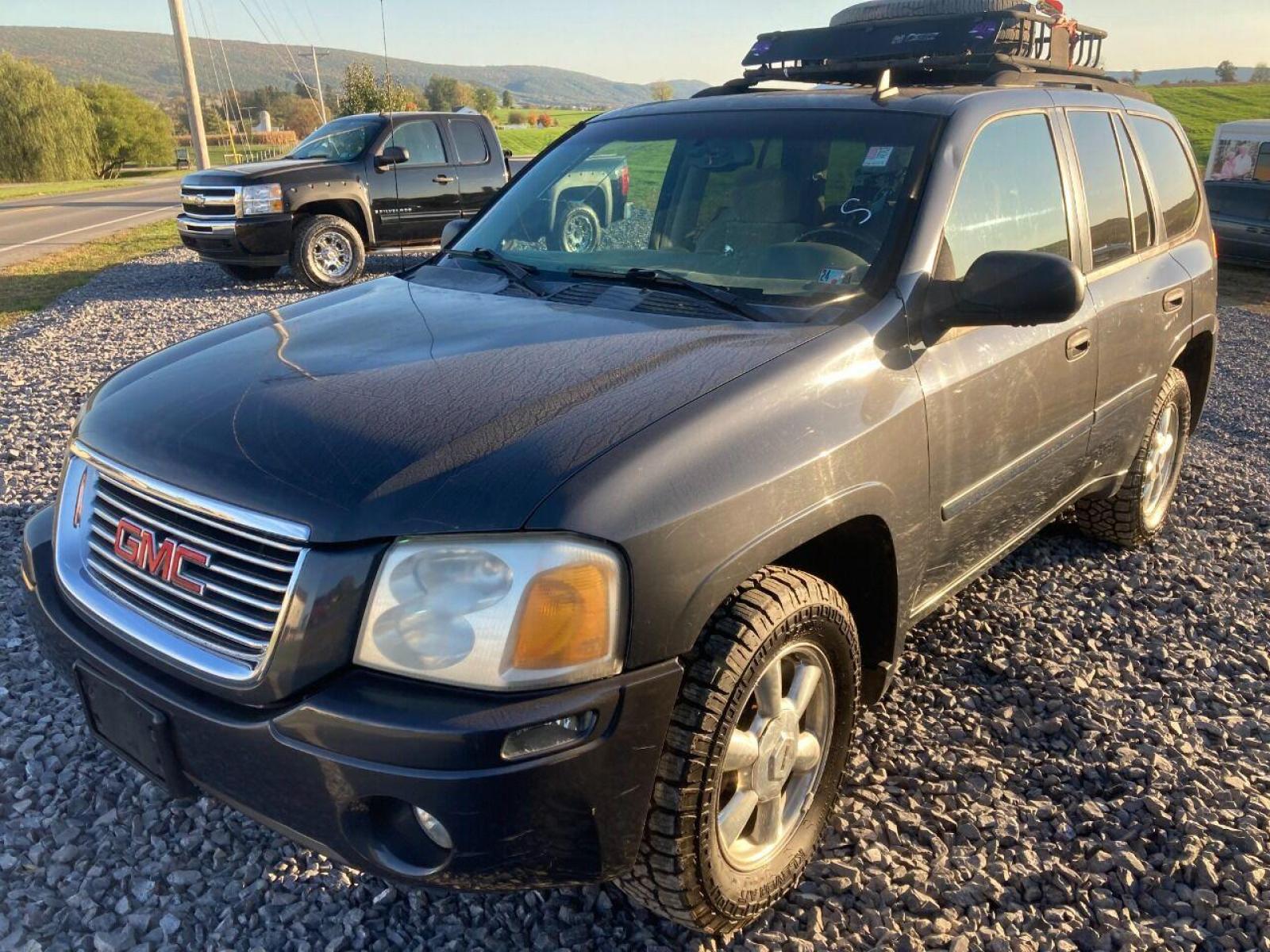 2007 Black GMC Envoy (1GKDT13S172) with an 4.2L I6 4.2L I6 engine, located at 4845 Woodbury Pike, Roaring Springs, PA, (814) 317-5008, (814) 317-5008, 40.250935, -78.366959 - 2007 GMC Envoy, 220k, automatic, 4x4, new tires, new inspection. Southern vehicle! Beautiful undercarriage! Rust free frame! Body is in excellent condition! Runs and drives 100%! If interested, please call 814-317-5008 or 814-497-4383. - Photo #0