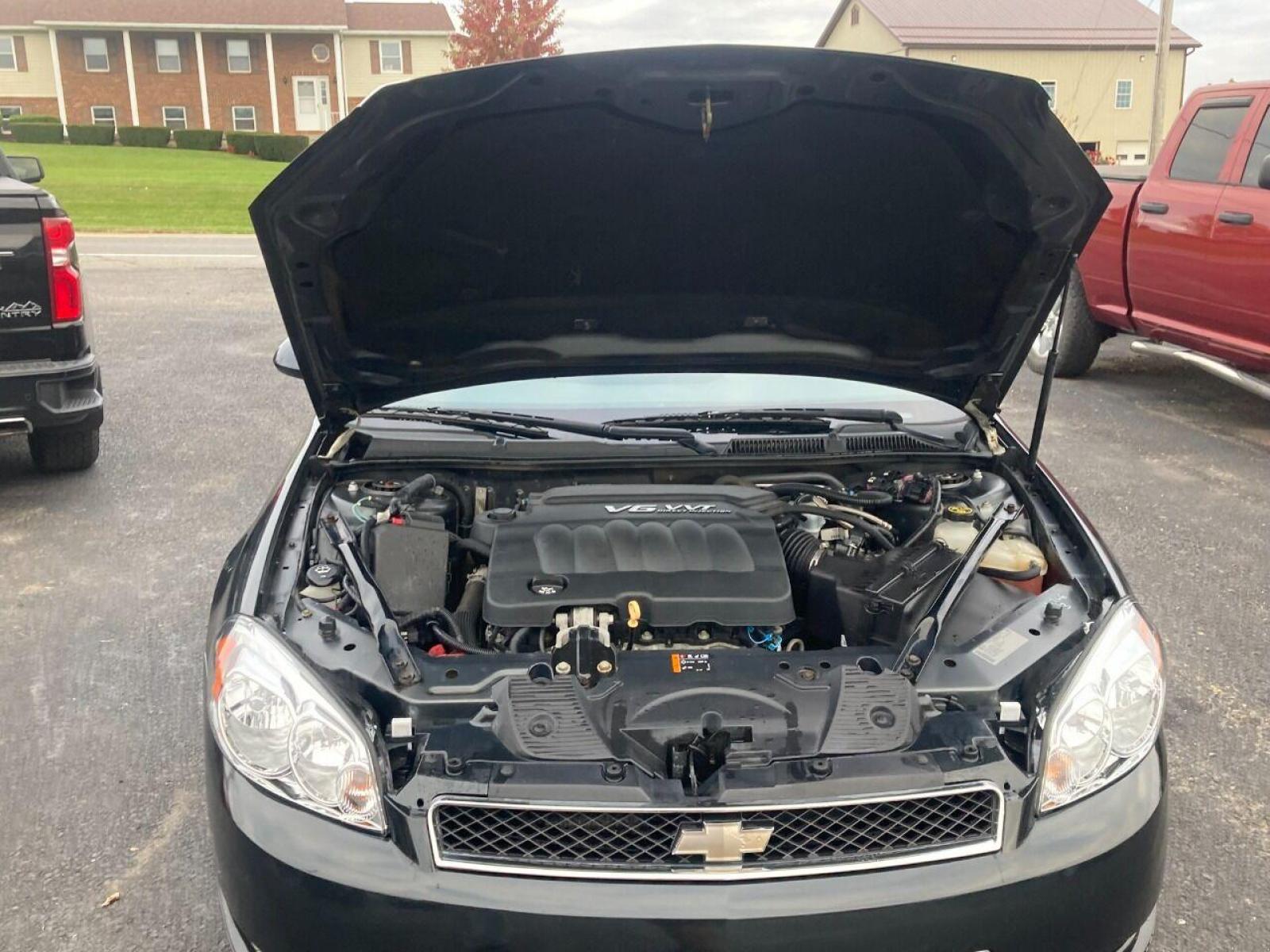 2013 Black Chevrolet Impala (2G1WD5E3XD1) with an 3.6L V6 3.6L V6 engine, located at 4845 Woodbury Pike, Roaring Springs, PA, (814) 317-5008, (814) 317-5008, 40.250935, -78.366959 - 2013 Chevy Impala, 140k, V6, automatic, 1 owner, FWD, Flex Fuel, power windows/locks, cruise/tilt , air conditioning, new tires, new inspection. Ready to go! Southern vehicle! Well maintained government vehicle. Rust free! Super clean! If interested, please call 814-317-5008 or 814-497-4383. - Photo #12