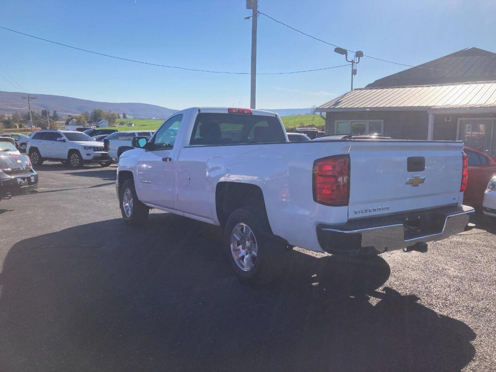 2014 White Chevrolet Silverado 1500 (1GCNCREC8EZ) with an 5.3L V8 5.3L V8 engine, located at 4845 Woodbury Pike, Roaring Springs, PA, (814) 317-5008, (814) 317-5008, 40.250935, -78.366959 - 2014 Chevy Silverado 1500 LT, automatic, 160k, 4x2, power windows/locks, cruise/tilt wheel, rear back up camera, Bluetooth, Navigation, factory trailer brake, steering controls, 5.3L V8. Truck has a brand new transmission, which comes with five year warranty. Southern truck! Rust free! If inter - Photo #2