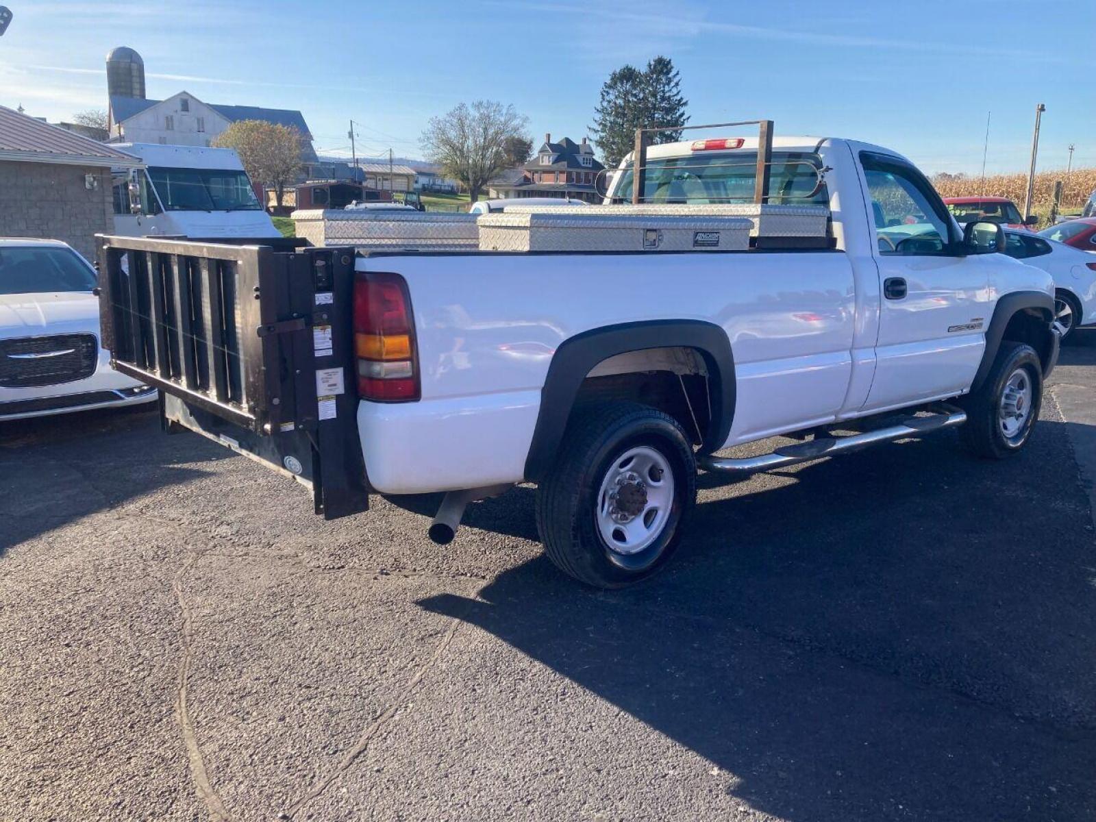 2003 White GMC Sierra 2500HD (1GTHC24183E) with an 6.6L V8 Turbocharger 6.6L V8 engine, located at 4845 Woodbury Pike, Roaring Springs, PA, (814) 317-5008, (814) 317-5008, 40.250935, -78.366959 - Photo #2