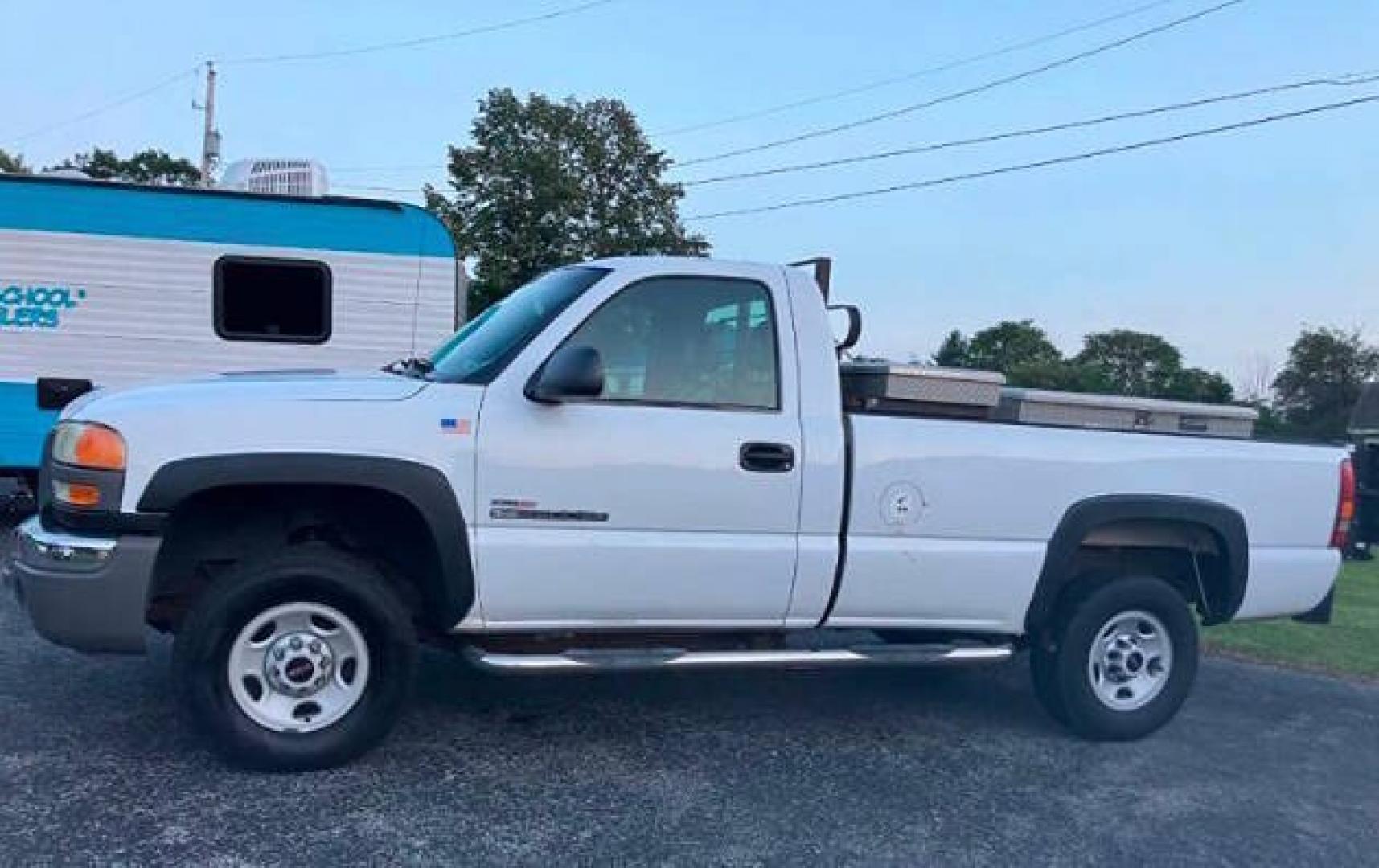 2003 Summit White GMC Sierra 2500HD (1GTHC24183E) with an Duramax 6.6L Diesel Turbo V8 300hp 520ft. lbs. 6.6L V8 engine, located at 4845 Woodbury Pike, Roaring Springs, PA, (814) 317-5008, (814) 317-5008, 40.250935, -78.366959 - **This vehicle is located at our sister dealership, Smithmill Car Store, not at our Roaring Spring location<br /><br />1 Owner! 2003 GMC Sierra 2500 HD, 6.6 Duramax, Allison automatic, 4x2, Southern truck! Rust free! Virginia DOT truck. Truck was highly maintained. Has power liftgate. Truck has new- Photo#1