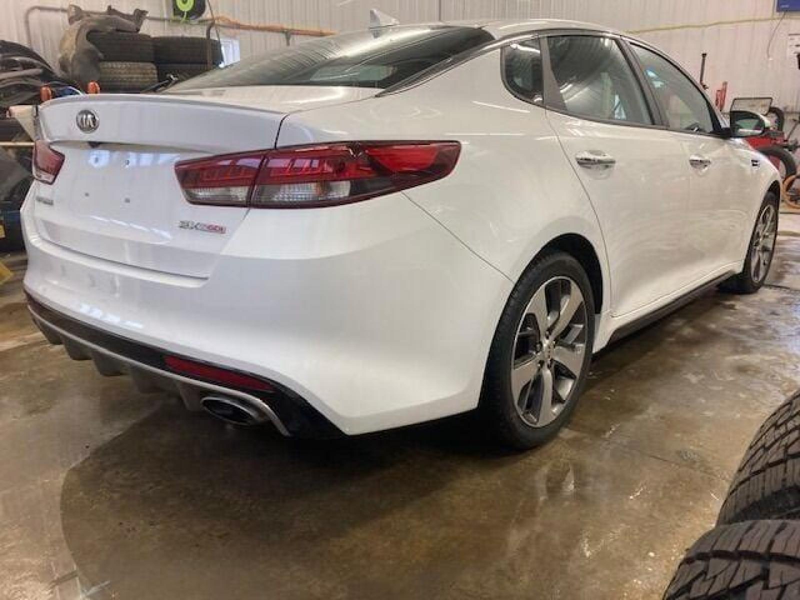 2017 White Kia Optima (5XXGW4L28HG) with an 2.0L I4 Turbocharger 2.0L I4 engine, located at 4845 Woodbury Pike, Roaring Springs, PA, (814) 317-5008, (814) 317-5008, 40.250935, -78.366959 - 2017 Kia Optima SX, turbo, FWD, automatic, 45k, leather, power windows/locks, Bluetooth, aluminum wheels, new tires, new inspection/brakes/rotors, rear back up, steering controls, heated seats and much more. Vehicle is being sold cheap due to having a Reconstructed title. Vehicle had light passeng - Photo #2