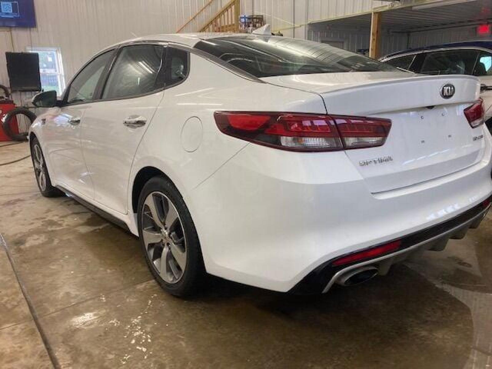2017 White Kia Optima (5XXGW4L28HG) with an 2.0L I4 Turbocharger 2.0L I4 engine, located at 4845 Woodbury Pike, Roaring Springs, PA, (814) 317-5008, (814) 317-5008, 40.250935, -78.366959 - 2017 Kia Optima SX, turbo, FWD, automatic, 45k, leather, power windows/locks, Bluetooth, aluminum wheels, new tires, new inspection/brakes/rotors, rear back up, steering controls, heated seats and much more. Vehicle is being sold cheap due to having a Reconstructed title. Vehicle had light passeng - Photo #4