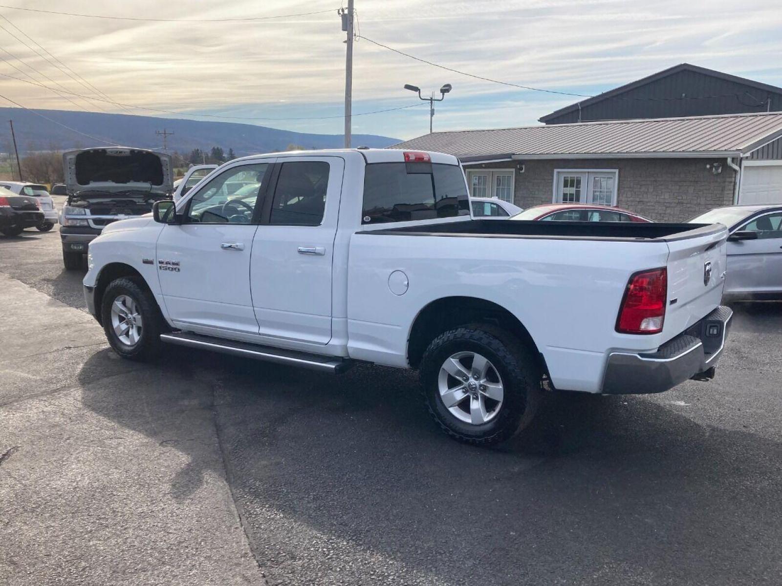 2014 White RAM 1500 (1C6RR7GT8ES) with an 5.7L V8 5.7L V8 engine, located at 4845 Woodbury Pike, Roaring Springs, PA, (814) 317-5008, (814) 317-5008, 40.250935, -78.366959 - 2014 Dodge Ram 1500, Quad cab, SLT, 5.7 Hemi, 4x4, 189k, aluminum wheels/running boards, rear back up camera, factory trailer brake, trip trailer package, power seat, flip up center console, new inspection. Truck is serviced and ready to go! Southern truck! Well maintained! Will come with a warr - Photo #1