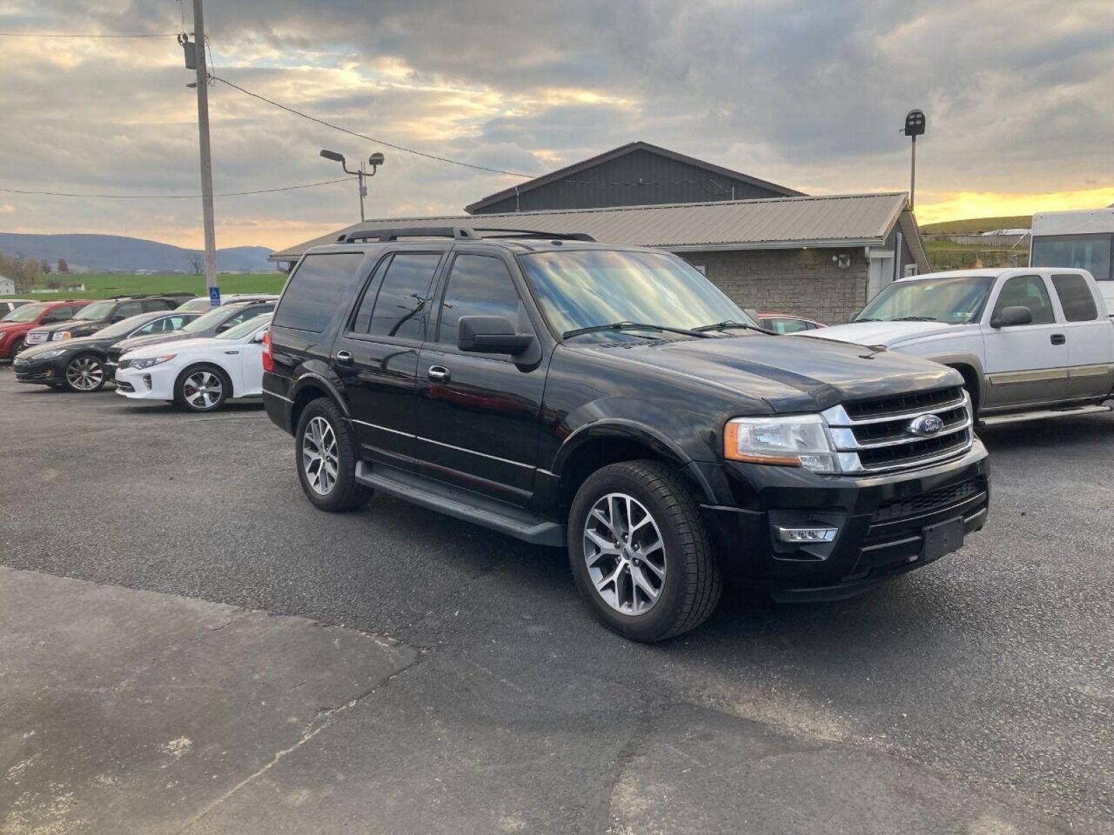 2015 Black Ford Expedition (1FMJU1HT7FE) with an 3.5L V6 Twin Turbocharger 3.5L V6 engine, located at 4845 Woodbury Pike, Roaring Springs, PA, (814) 317-5008, (814) 317-5008, 40.250935, -78.366959 - 2015 Ford Expedition XLT, automatic, 3.5L, eco-boost, leather, 3rd row, Sony sound system, Navigation, heated and a/c seats, rear back up, power seats, power locks, new tires, new inspection, factory trailer brake, 4x2, tow package, locking rear differential and so much more. Southern vehicle! Rus - Photo #1