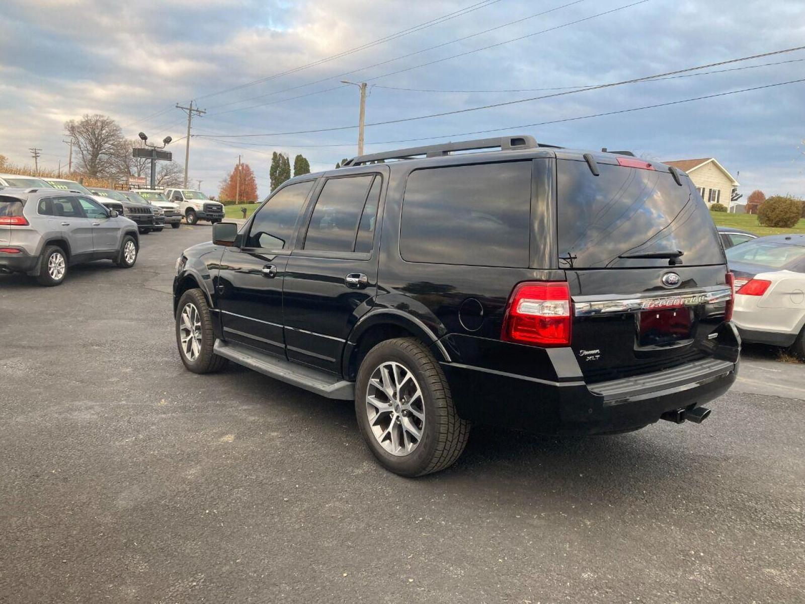 2015 Black Ford Expedition (1FMJU1HT7FE) with an 3.5L V6 Twin Turbocharger 3.5L V6 engine, located at 4845 Woodbury Pike, Roaring Springs, PA, (814) 317-5008, (814) 317-5008, 40.250935, -78.366959 - 2015 Ford Expedition XLT, automatic, 3.5L, eco-boost, leather, 3rd row, Sony sound system, Navigation, heated and a/c seats, rear back up, power seats, power locks, new tires, new inspection, factory trailer brake, 4x2, tow package, locking rear differential and so much more. Southern vehicle! Rus - Photo #2