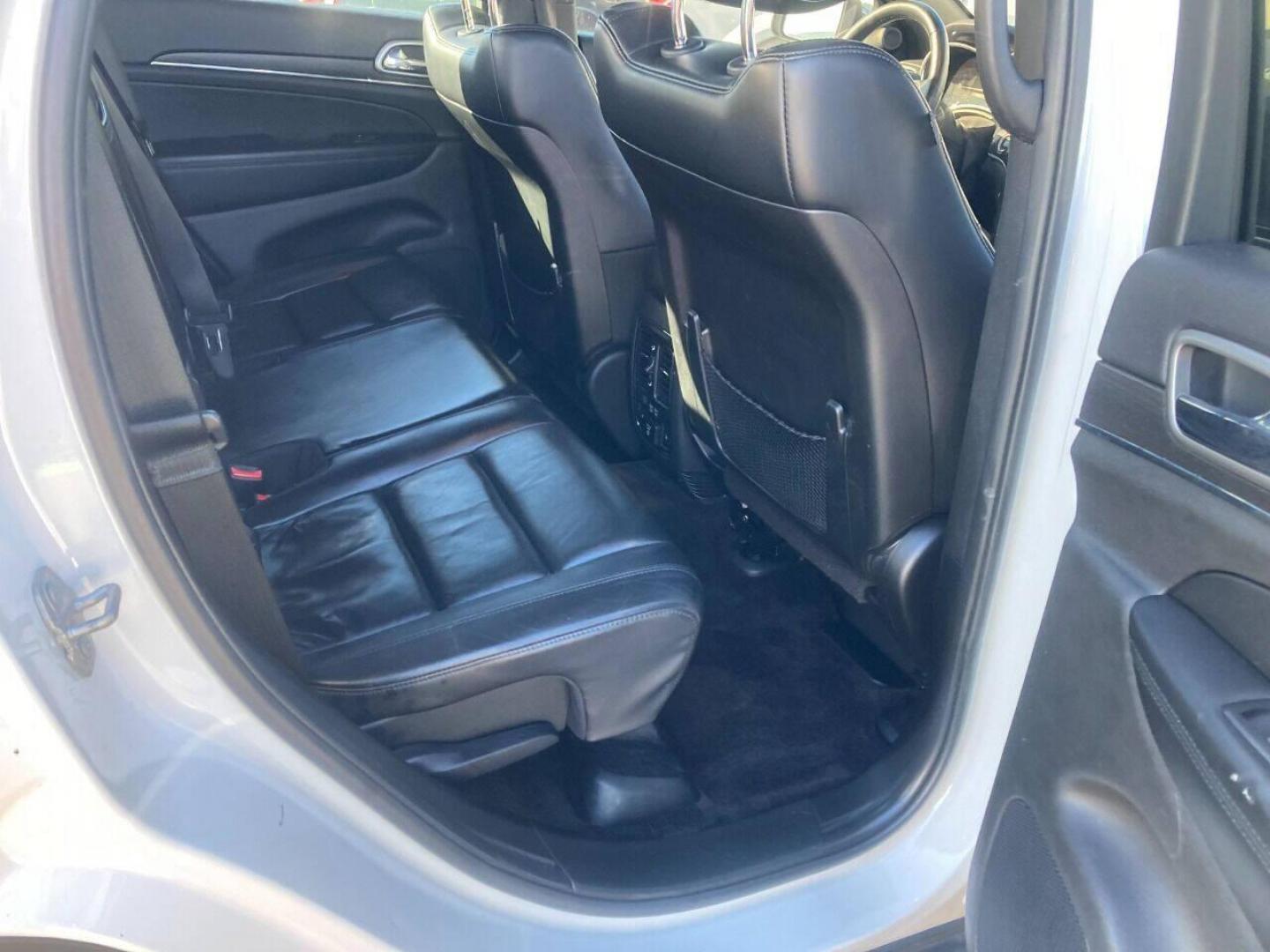 2018 White Jeep Grand Cherokee (1C4RJFBG4JC) with an 3.6L V6 3.6L V6 engine, located at 4845 Woodbury Pike, Roaring Springs, PA, (814) 317-5008, (814) 317-5008, 40.250935, -78.366959 - 2018 Jeep Grand Cherokee, 4x4, V6, automatic, power windows/locks, air conditioning, Navigation, rear back up camera, heated seats, new tires, new inspection and more. Super clean! Will come with a warranty with the option to upgrade. If interested, please call 814-317-5008 or 814-497-4383. Th - Photo#7