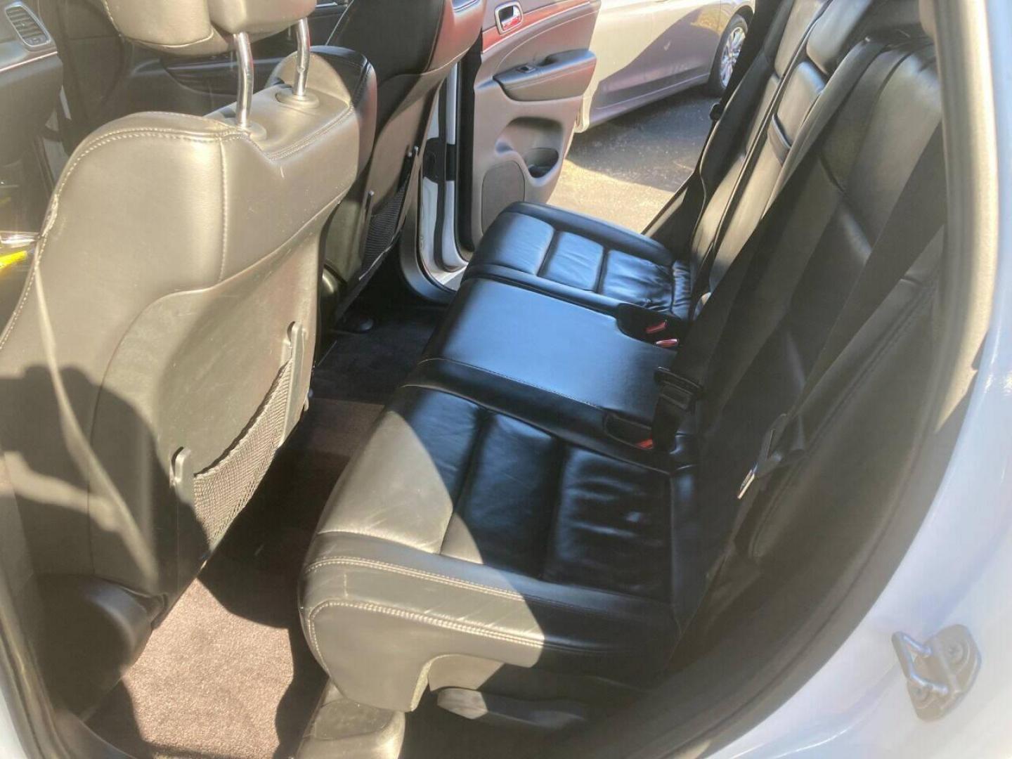 2018 White Jeep Grand Cherokee (1C4RJFBG4JC) with an 3.6L V6 3.6L V6 engine, located at 4845 Woodbury Pike, Roaring Springs, PA, (814) 317-5008, (814) 317-5008, 40.250935, -78.366959 - 2018 Jeep Grand Cherokee, 4x4, V6, automatic, power windows/locks, air conditioning, Navigation, rear back up camera, heated seats, new tires, new inspection and more. Super clean! Will come with a warranty with the option to upgrade. If interested, please call 814-317-5008 or 814-497-4383. Th - Photo#9