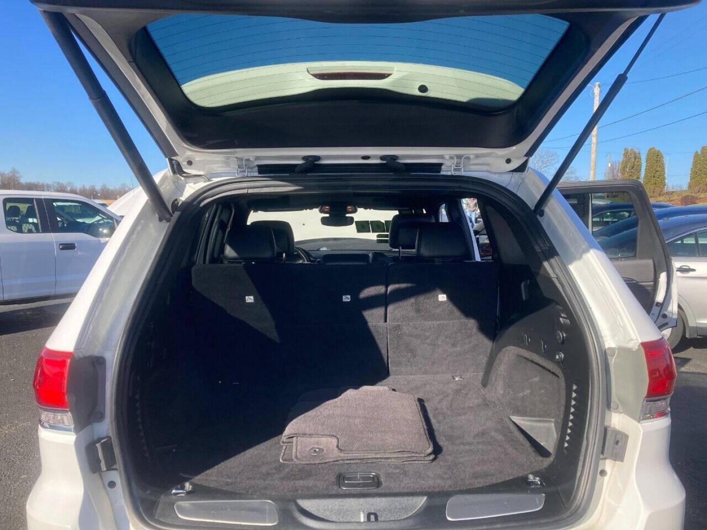 2018 White Jeep Grand Cherokee (1C4RJFBG4JC) with an 3.6L V6 3.6L V6 engine, located at 4845 Woodbury Pike, Roaring Springs, PA, (814) 317-5008, (814) 317-5008, 40.250935, -78.366959 - 2018 Jeep Grand Cherokee, 4x4, V6, automatic, power windows/locks, air conditioning, Navigation, rear back up camera, heated seats, new tires, new inspection and more. Super clean! Will come with a warranty with the option to upgrade. If interested, please call 814-317-5008 or 814-497-4383. Th - Photo#11