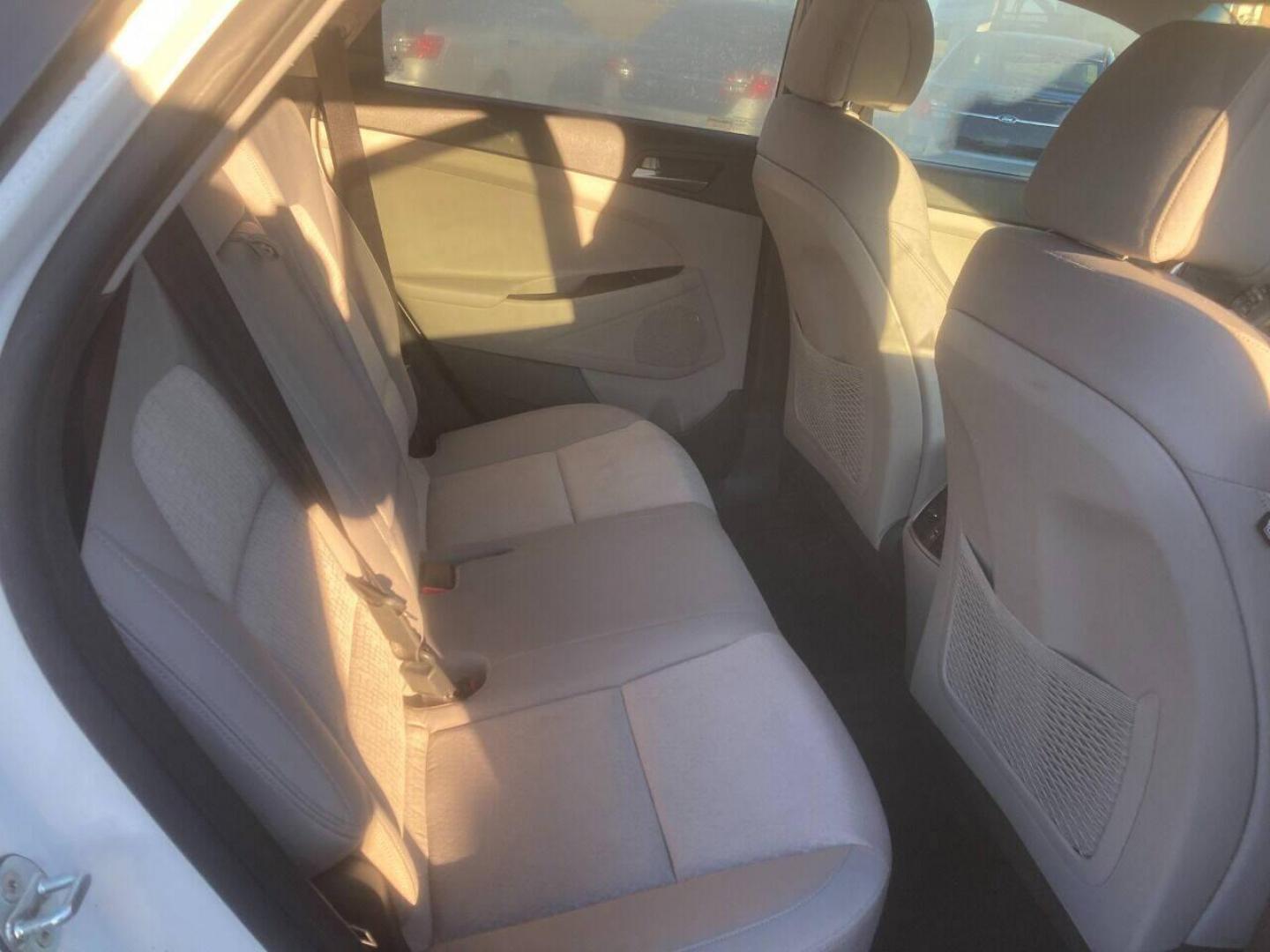 2017 White Hyundai Tucson (KM8J3CA21HU) with an 1.6L I4 Turbocharger 1.6L I4 engine, located at 4845 Woodbury Pike, Roaring Springs, PA, (814) 317-5008, (814) 317-5008, 40.250935, -78.366959 - 2017 Hyundai Tucson, Eco, AWD, 1.6L, automatic, power windows/locks, cruise/tilt, air, new tires, new inspection. Southern vehicle! Excellent condition! Super clean must see condition! Will come with a warranty with the option to upgrade. If interested, please call 814-317-5008. - Photo#12