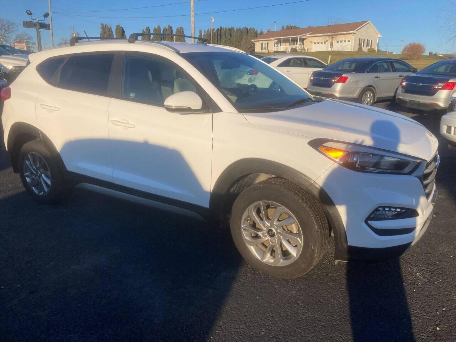 2017 White Hyundai Tucson (KM8J3CA21HU) with an 1.6L I4 Turbocharger 1.6L I4 engine, located at 4845 Woodbury Pike, Roaring Springs, PA, (814) 317-5008, (814) 317-5008, 40.250935, -78.366959 - 2017 Hyundai Tucson, Eco, AWD, 1.6L, automatic, power windows/locks, cruise/tilt, air, new tires, new inspection. Southern vehicle! Excellent condition! Super clean must see condition! Will come with a warranty with the option to upgrade. If interested, please call 814-317-5008. - Photo #1