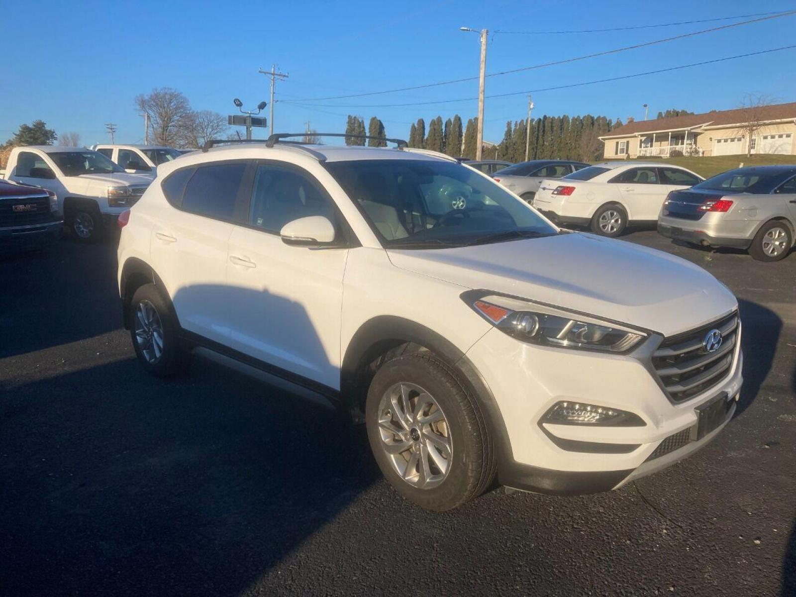 2017 White Hyundai Tucson (KM8J3CA21HU) with an 1.6L I4 Turbocharger 1.6L I4 engine, located at 4845 Woodbury Pike, Roaring Springs, PA, (814) 317-5008, (814) 317-5008, 40.250935, -78.366959 - 2017 Hyundai Tucson, Eco, AWD, 1.6L, automatic, power windows/locks, cruise/tilt, air, new tires, new inspection. Southern vehicle! Excellent condition! Super clean must see condition! Will come with a warranty with the option to upgrade. If interested, please call 814-317-5008. - Photo #4