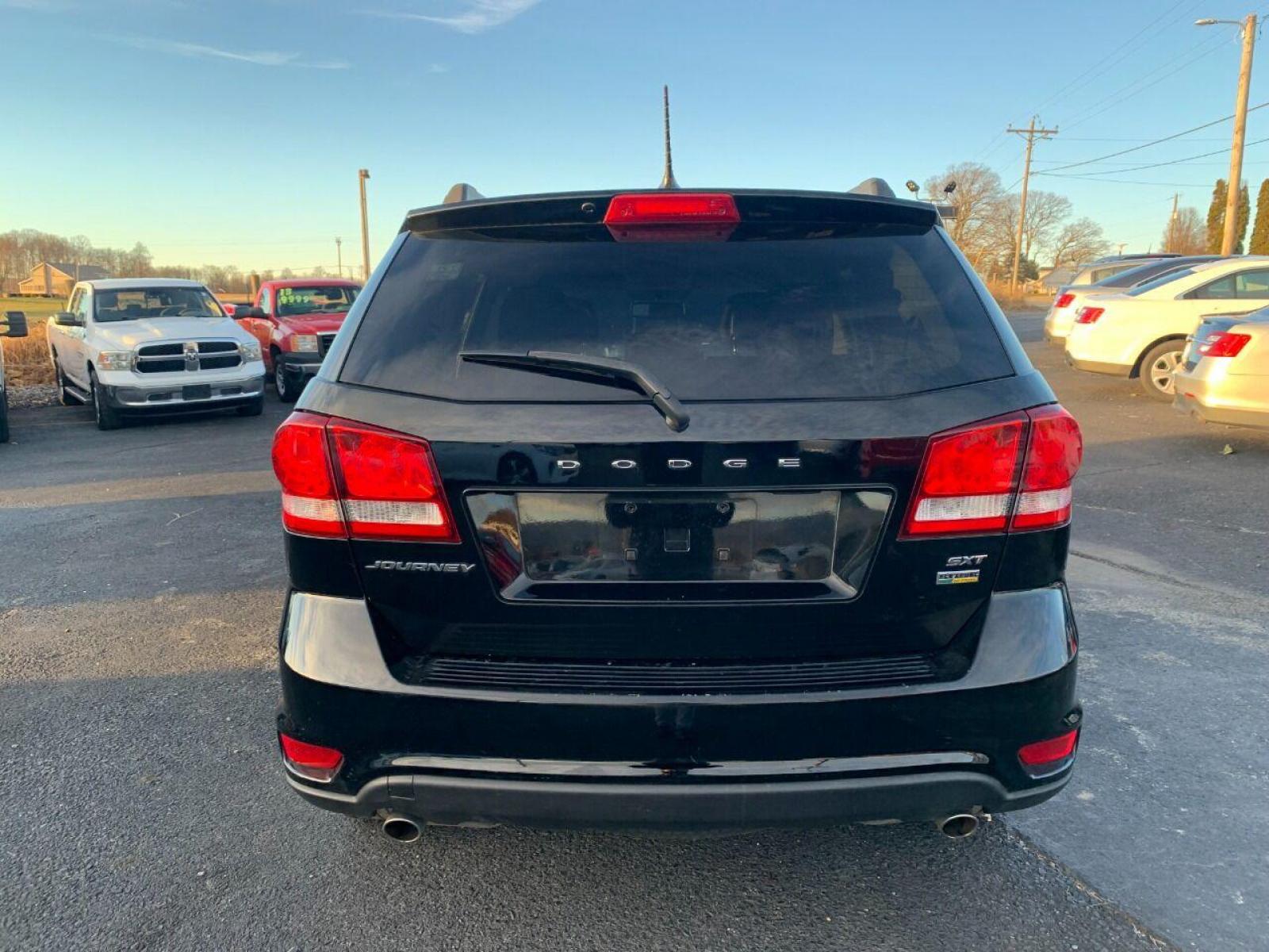 2017 Black Dodge Journey (3C4PDCBG9HT) with an 3.6L V6 3.6L V6 engine, located at 4845 Woodbury Pike, Roaring Springs, PA, (814) 317-5008, (814) 317-5008, 40.250935, -78.366959 - Photo #3