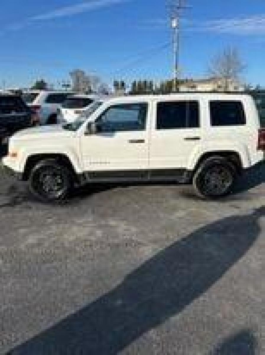 2017 White Jeep Patriot (1C4NJRBB6HD) with an 2.4L I4 2.4L I4 engine, located at 4845 Woodbury Pike, Roaring Springs, PA, (814) 317-5008, (814) 317-5008, 40.250935, -78.366959 - 2017 Jeep Patriot, automatic, 70k, 4x4, air conditioning, rear defroster, manual windows and locks. Vehicle is being sold cheap due to having a Reconstructed title. Vehicle had light deer damage grill, bumper cover and hood were replaced. Parts were replaced with the same color NO PAINTWORK was d - Photo #1