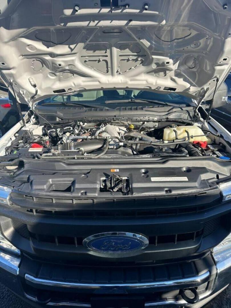 2020 White Ford F-250 Super Duty (1FT7X2BT7LE) with an 6.7L V8 Turbocharger 6.7L V8 engine, located at 4845 Woodbury Pike, Roaring Springs, PA, (814) 317-5008, (814) 317-5008, 40.250935, -78.366959 - 2020 F-250 Super Duty 6.7L, V8, power stroke diesel, automatic, 4x4 53k Power windows/locks/mirrors, manual seats, air conditioning, 8 ft bed, new tires, vinyl seats and more. If interested, please call 814-317-5008 or 814-497-4383. - Photo#5