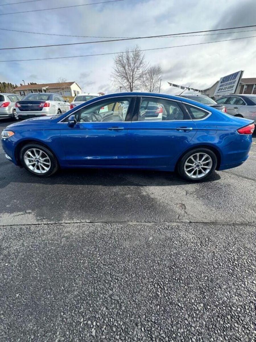 2017 Blue Ford Fusion (3FA6P0HD7HR) with an 1.5L I4 Turbocharger 1.5L I4 engine, located at 4845 Woodbury Pike, Roaring Springs, PA, (814) 317-5008, (814) 317-5008, 40.250935, -78.366959 - Photo #0