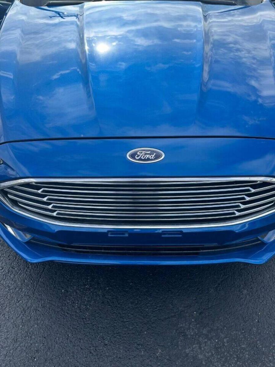 2017 Blue Ford Fusion (3FA6P0HD7HR) with an 1.5L I4 Turbocharger 1.5L I4 engine, located at 4845 Woodbury Pike, Roaring Springs, PA, (814) 317-5008, (814) 317-5008, 40.250935, -78.366959 - Photo #4