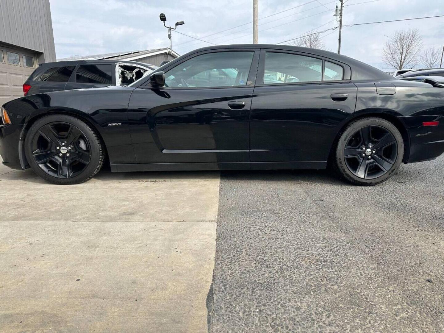 2011 Black Dodge Charger (2B3CL5CT9BH) with an 5.7L V8 5.7L V8 engine, located at 4845 Woodbury Pike, Roaring Springs, PA, (814) 317-5008, (814) 317-5008, 40.250935, -78.366959 - Rare vehicle! 2011 Dodge Charger RT, Mopar 11, 1 of 1272 cars produce, automatic, 5.7 L, V8, RWD, leather and more. This vehicle has lots of extra options! If interested, please call 814-317-50087 or 814-497-4383. - Photo#0