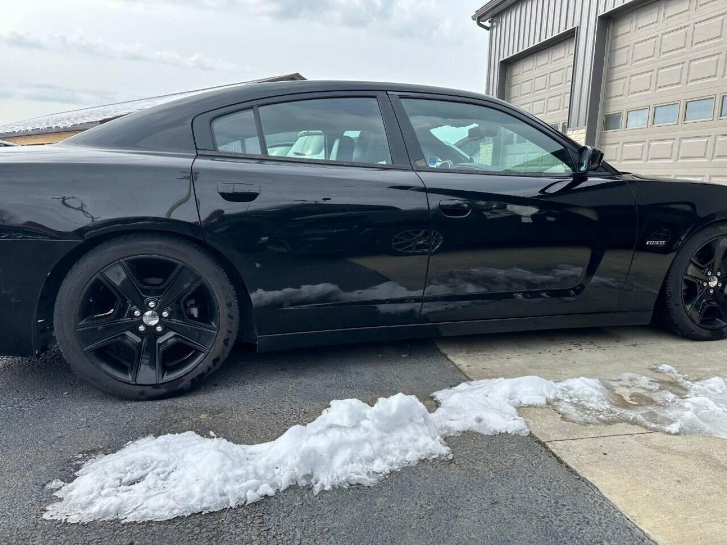 2011 Black Dodge Charger (2B3CL5CT9BH) with an 5.7L V8 5.7L V8 engine, located at 4845 Woodbury Pike, Roaring Springs, PA, (814) 317-5008, (814) 317-5008, 40.250935, -78.366959 - Rare vehicle! 2011 Dodge Charger RT, Mopar 11, 1 of 1272 cars produce, automatic, 5.7 L, V8, RWD, leather and more. This vehicle has lots of extra options! If interested, please call 814-317-50087 or 814-497-4383. - Photo#1