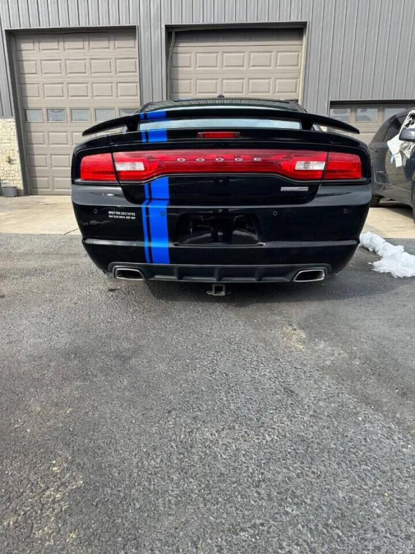 2011 Black Dodge Charger (2B3CL5CT9BH) with an 5.7L V8 5.7L V8 engine, located at 4845 Woodbury Pike, Roaring Springs, PA, (814) 317-5008, (814) 317-5008, 40.250935, -78.366959 - Rare vehicle! 2011 Dodge Charger RT, Mopar 11, 1 of 1272 cars produce, automatic, 5.7 L, V8, RWD, leather and more. This vehicle has lots of extra options! If interested, please call 814-317-50087 or 814-497-4383. - Photo#3