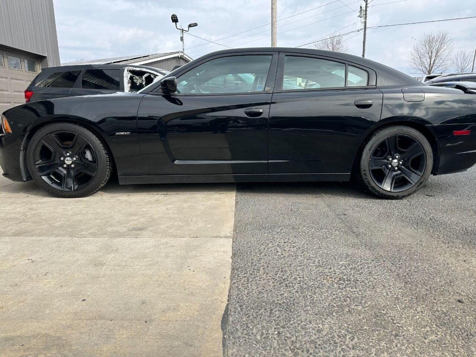 2011 Black Dodge Charger (2B3CL5CT9BH) with an 5.7L V8 5.7L V8 engine, located at 4845 Woodbury Pike, Roaring Springs, PA, (814) 317-5008, (814) 317-5008, 40.250935, -78.366959 - Rare vehicle! 2011 Dodge Charger RT, automatic, 5.7 L, V8, RWD, leather and more. This vehicle has lots of extra options! If interested, please call 814-317-50087 or 814-497-4383. - Photo #0