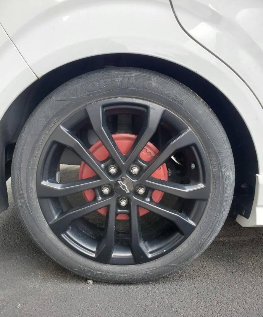 2019 White Chevrolet Sonic (1G1JF6SBXK4) with an 1.4L I4 Turbocharger 1.4L I4 engine, located at 4845 Woodbury Pike, Roaring Springs, PA, (814) 317-5008, (814) 317-5008, 40.250935, -78.366959 - 2019 Chevy Sonic RS package, automatic, FWD, 4 cylinder, Turbocharger, leather, Navigation, rear back up, 32k. Vehicle is extra clean! Vehicle is a Reconstructed title due to light deer damage to front fender and door. Parts were replaced with ones the same color. No paintwork was done! Will com - Photo#4