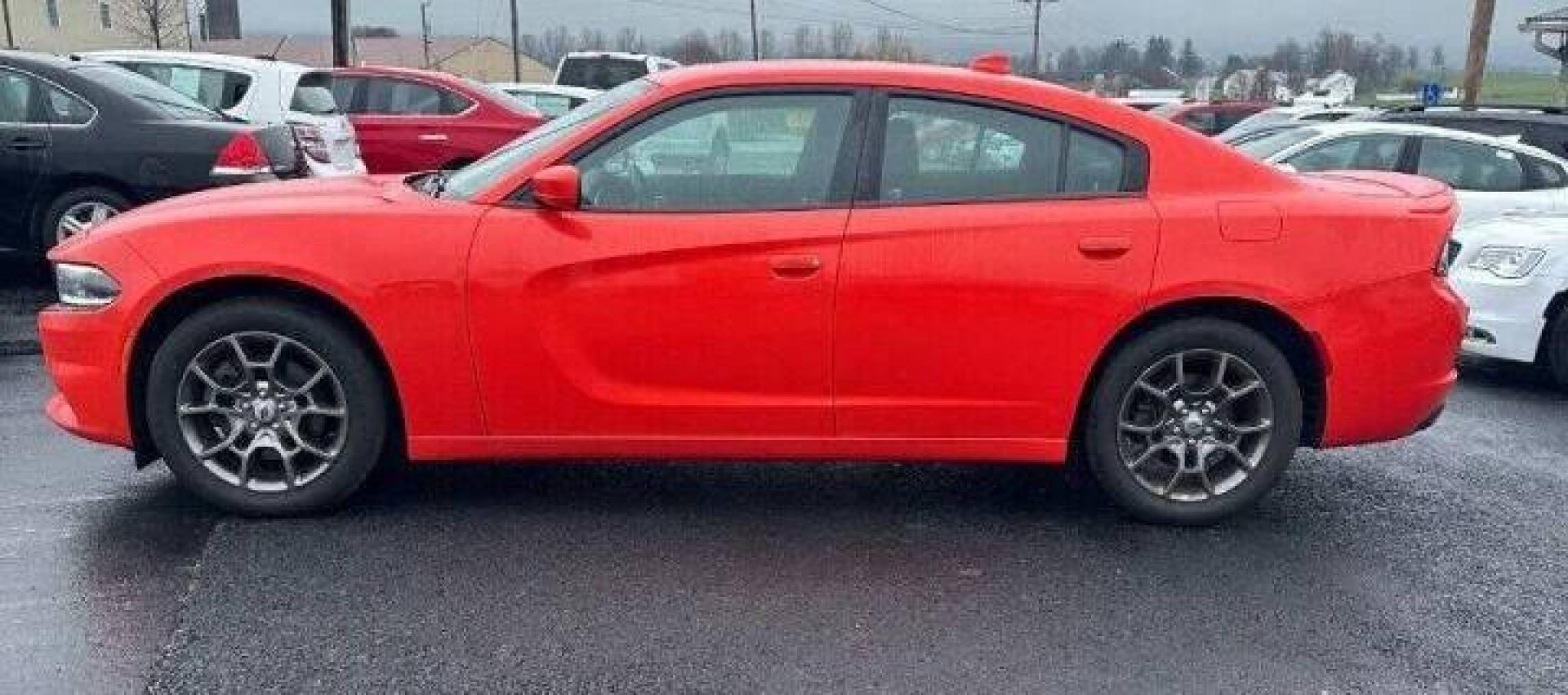 2017 Orange Dodge Charger (2C3CDXJG1HH) with an 3.6L V6 3.6L V6 engine, located at 4845 Woodbury Pike, Roaring Springs, PA, (814) 317-5008, (814) 317-5008, 40.250935, -78.366959 - 2017 Dodge Charger SXT, V6, AWD, 70k Miles Remote Start, Heated Seats, A/c, Power Windows/Locks, Cruise Control, Big Screen Radio, Beats Audio System, Android Auto, Apple Carplay, Bluetooth, Sirius XM, Homelink Garage Door Opener, Super Clean! Will come with 3 mo./3,000-mile warranty with the optio - Photo#0