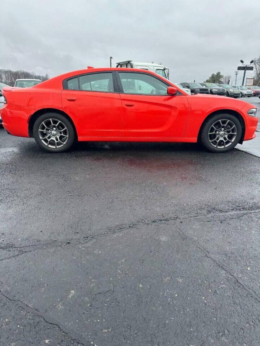 2017 Orange Dodge Charger (2C3CDXJG1HH) with an 3.6L V6 3.6L V6 engine, located at 4845 Woodbury Pike, Roaring Springs, PA, (814) 317-5008, (814) 317-5008, 40.250935, -78.366959 - 2017 Dodge Charger SXT, V6, AWD, 70k, power windows/locks, big screen radio, beats audio system. Super Clean! Vehicle has minor dent on passenger rear door. Will come with a warranty with the option to upgrade. If interested, please call 814-317-5008 or 814-497-4383. - Photo #0