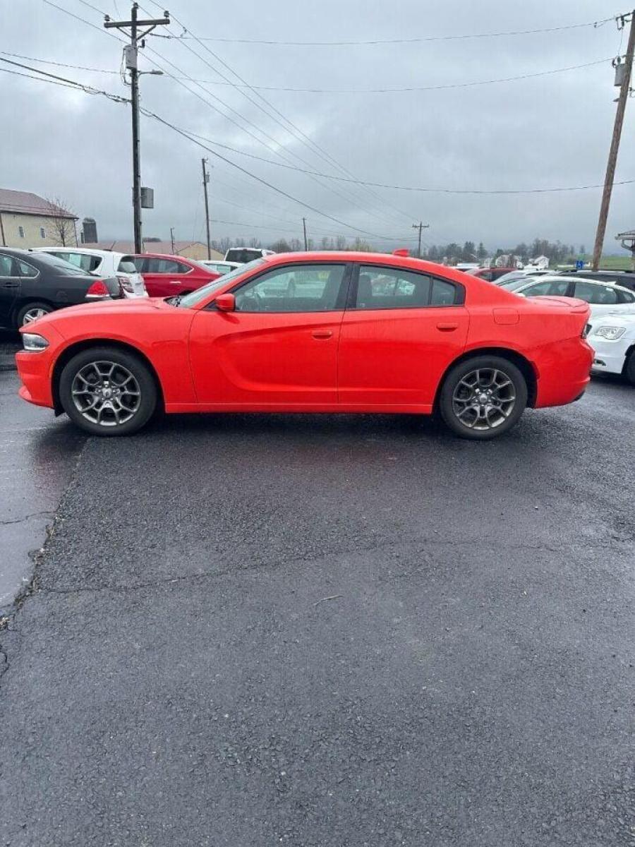 2017 Orange Dodge Charger (2C3CDXJG1HH) with an 3.6L V6 3.6L V6 engine, located at 4845 Woodbury Pike, Roaring Springs, PA, (814) 317-5008, (814) 317-5008, 40.250935, -78.366959 - 2017 Dodge Charger SXT, V6, AWD, 70k, power windows/locks, big screen radio, beats audio system. Super Clean! Vehicle has minor dent on passenger rear door. Will come with a warranty with the option to upgrade. If interested, please call 814-317-5008 or 814-497-4383. - Photo #1