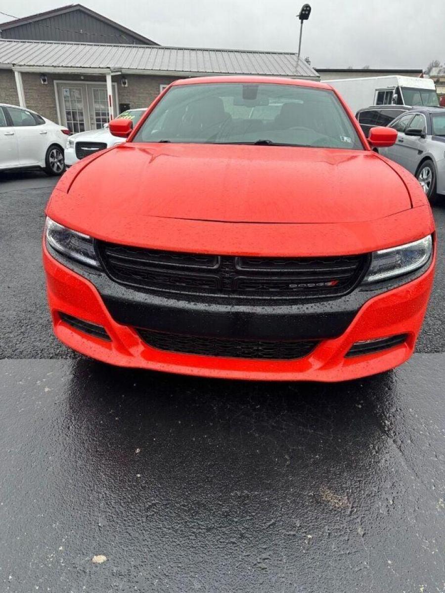 2017 Orange Dodge Charger (2C3CDXJG1HH) with an 3.6L V6 3.6L V6 engine, located at 4845 Woodbury Pike, Roaring Springs, PA, (814) 317-5008, (814) 317-5008, 40.250935, -78.366959 - 2017 Dodge Charger SXT, V6, AWD, 70k, power windows/locks, big screen radio, beats audio system. Super Clean! Vehicle has minor dent on passenger rear door. Will come with a warranty with the option to upgrade. If interested, please call 814-317-5008 or 814-497-4383. - Photo #2