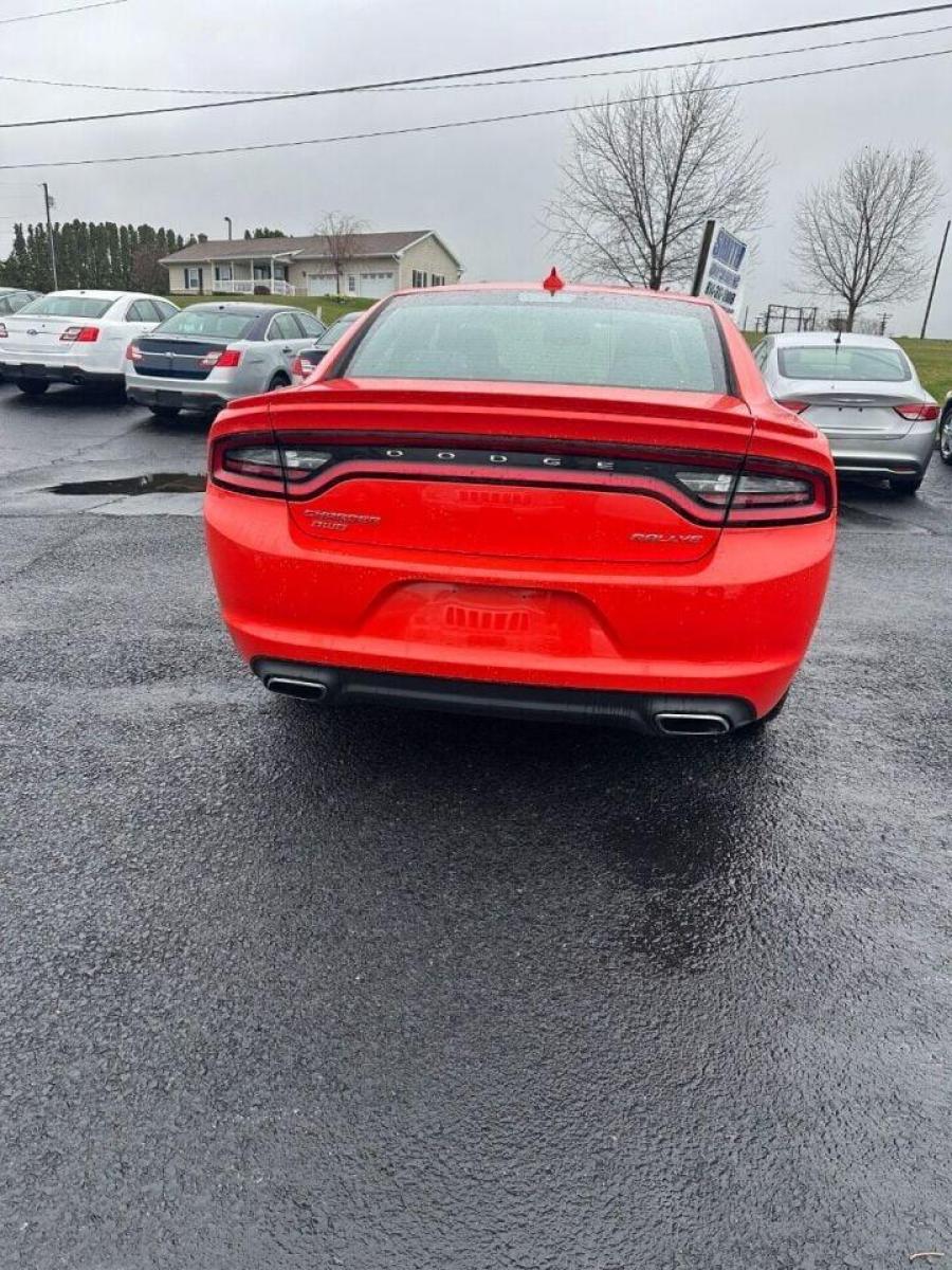 2017 Orange Dodge Charger (2C3CDXJG1HH) with an 3.6L V6 3.6L V6 engine, located at 4845 Woodbury Pike, Roaring Springs, PA, (814) 317-5008, (814) 317-5008, 40.250935, -78.366959 - 2017 Dodge Charger SXT, V6, AWD, 70k, power windows/locks, big screen radio, beats audio system. Super Clean! Vehicle has minor dent on passenger rear door. Will come with a warranty with the option to upgrade. If interested, please call 814-317-5008 or 814-497-4383. - Photo #3