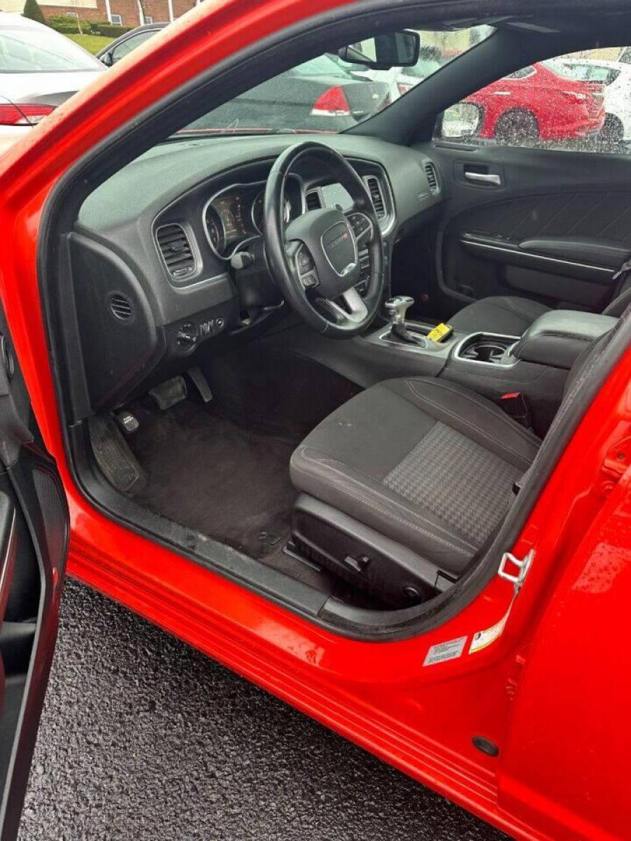 2017 Orange Dodge Charger (2C3CDXJG1HH) with an 3.6L V6 3.6L V6 engine, located at 4845 Woodbury Pike, Roaring Springs, PA, (814) 317-5008, (814) 317-5008, 40.250935, -78.366959 - 2017 Dodge Charger SXT, V6, AWD, 70k, power windows/locks, big screen radio, beats audio system. Super Clean! Vehicle has minor dent on passenger rear door. Will come with a warranty with the option to upgrade. If interested, please call 814-317-5008 or 814-497-4383. - Photo #5